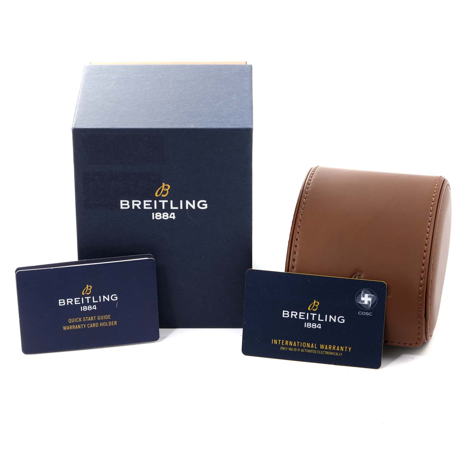 The image shows the accessories for a Breitling Superocean V17369 Men's Titanium Green Dial V17369 Men's Titanium Green Dial watch, including a box, leather carrying case, and warranty cards.