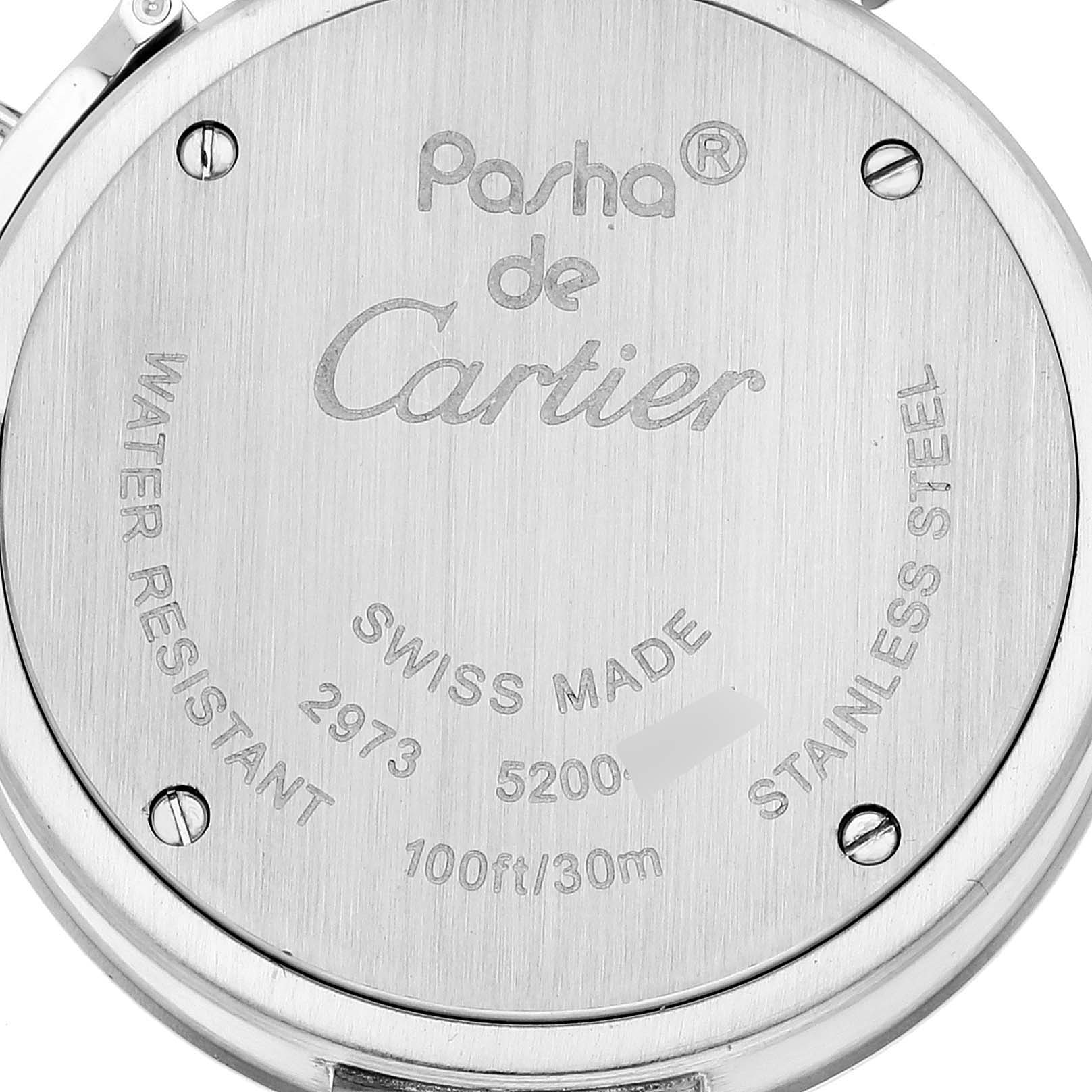 The image shows the back casing of a Pasha de Cartier watch, highlighting the brand, model, and specifications.
