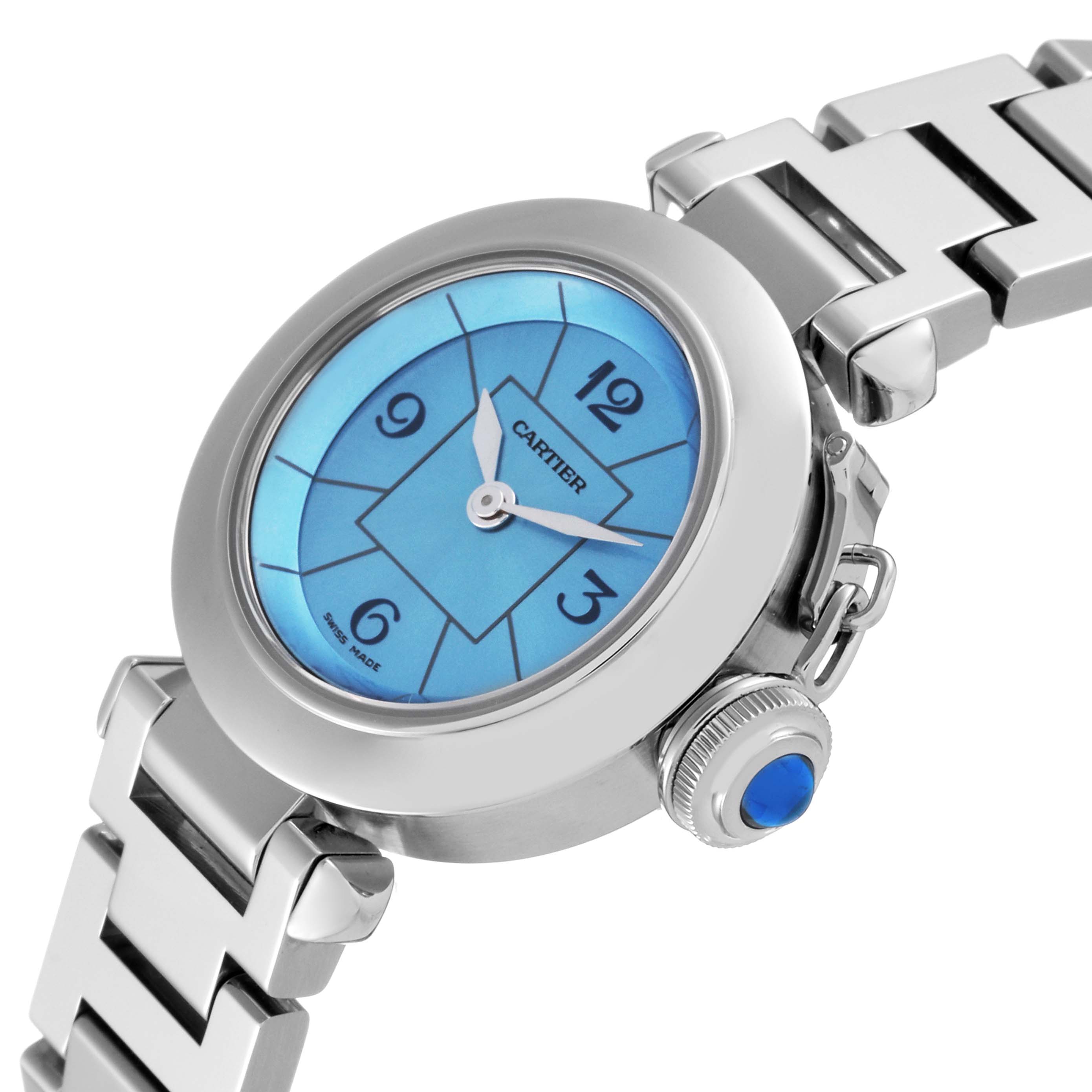 This image shows a close-up angle of the Cartier Pasha W3140024 Women's Stainless Steel Blue Dial W3140024 Women's Stainless Steel Blue Dial watch with a blue dial, crown, and part of the bracelet.