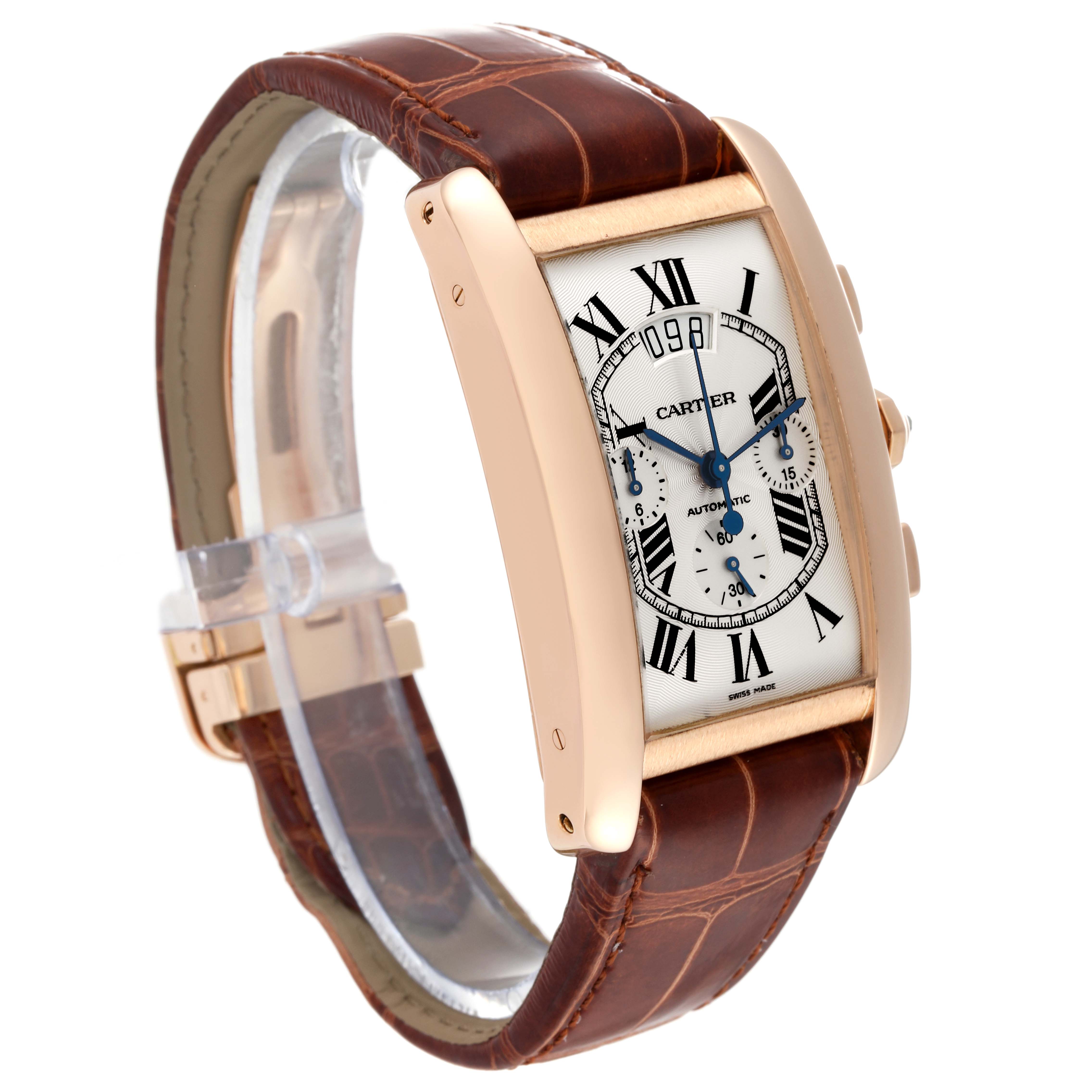 The image shows a side-front angle of a Cartier Tank Americaine W2610751 Men
s Rose Gold Silver Dial W2610751 Men
s Rose Gold Silver Dial watch, highlighting its face, leather strap, and rose gold case.