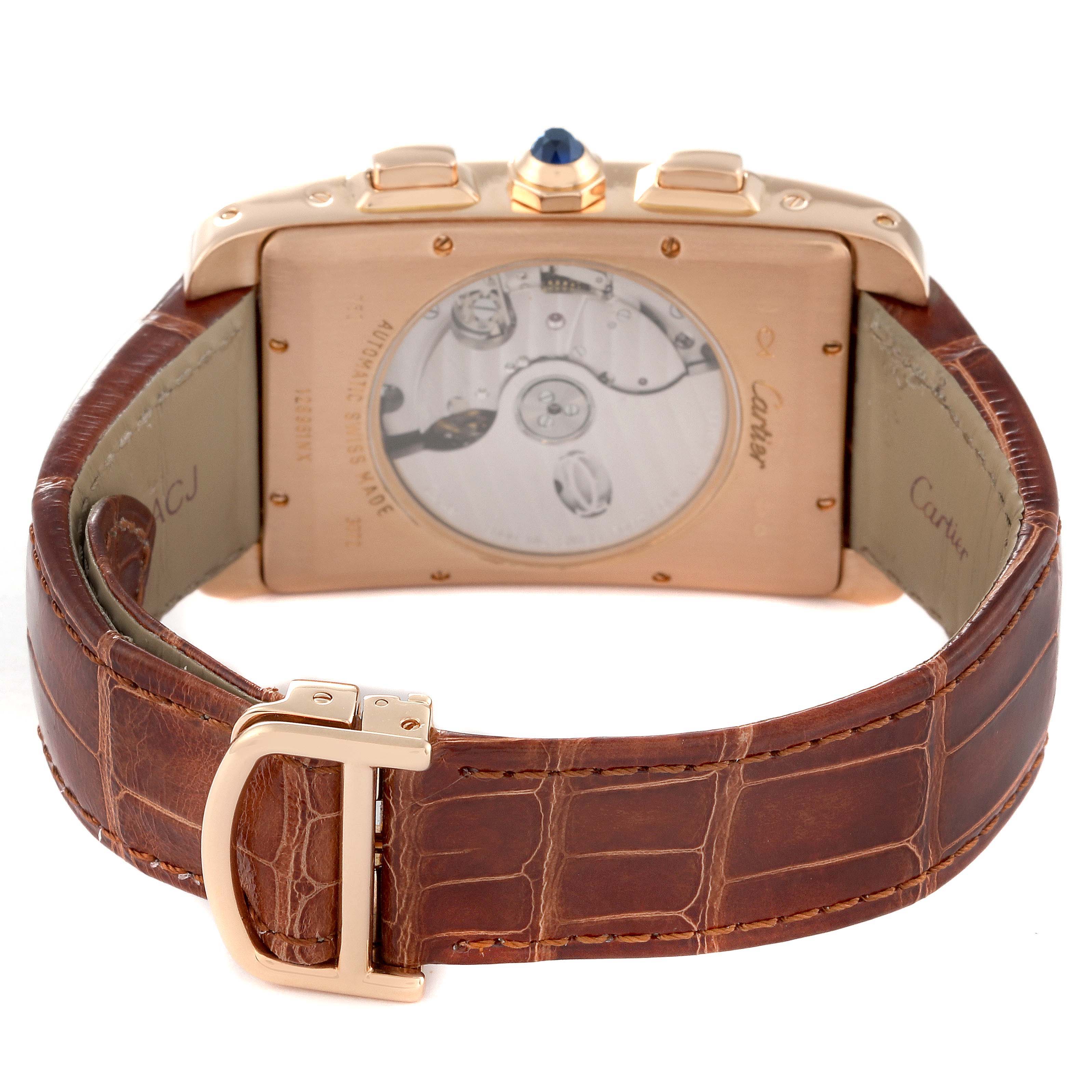 The image shows the back view of the Cartier Tank Americaine W2610751 Men
s Rose Gold Silver Dial W2610751 Men
s Rose Gold Silver Dial watch, focusing on its brown leather strap and visible internal mechanism.
