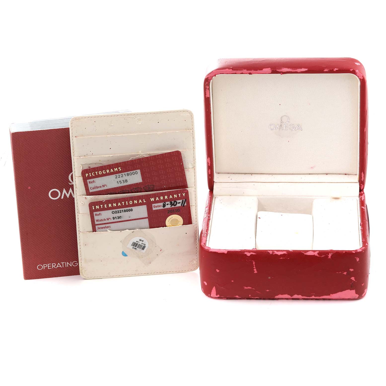 The image shows an Omega Seamaster 2221.80.00 Men
s Stainless Steel Blue Dial 2221.80.00 Men
s Stainless Steel Blue Dial watch box, warranty cards, and an operating manual, all viewed from the front.