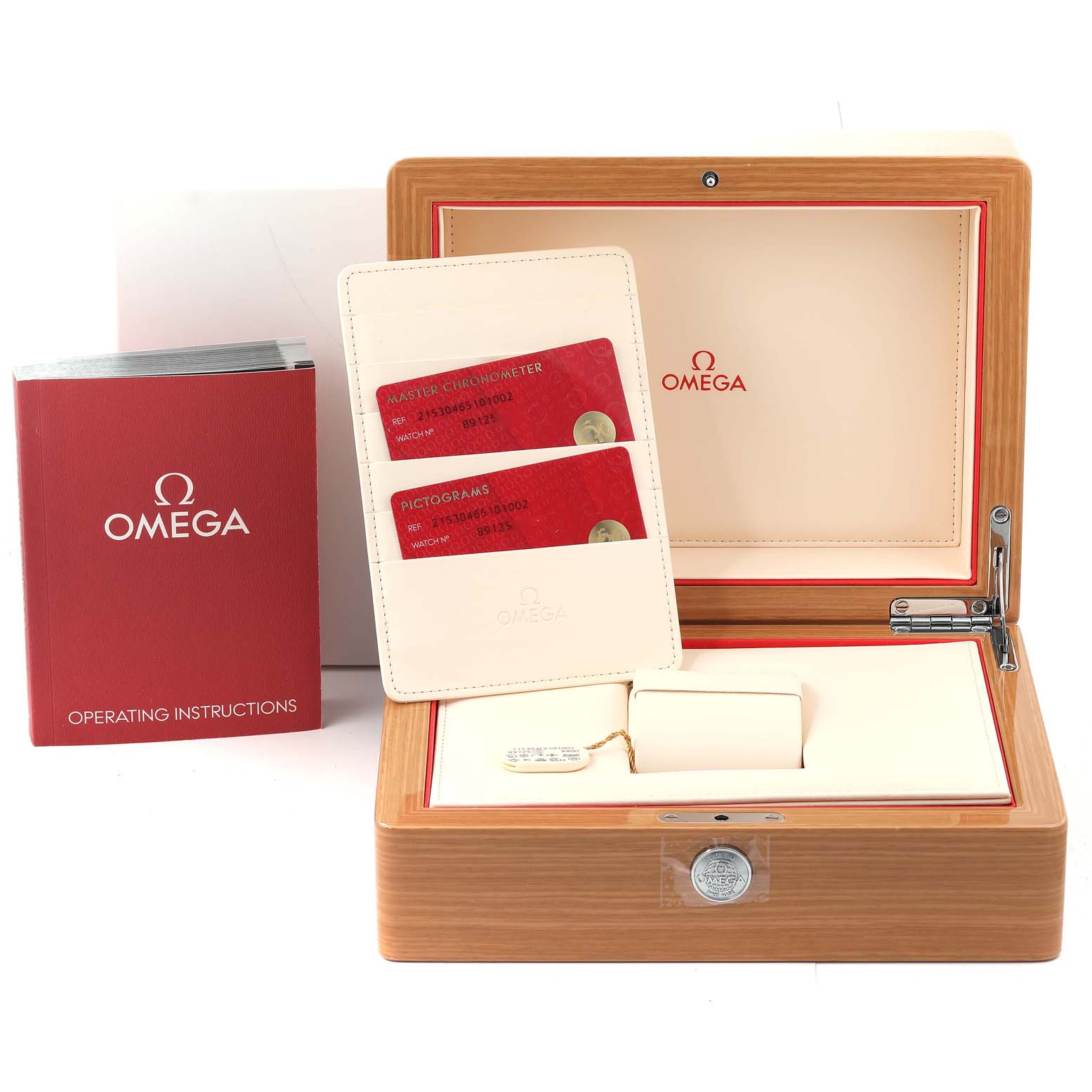 This image shows the Omega Planet Ocean 215.30.46.51.01.002 Men
s Stainless Steel Black Dial 215.30.46.51.01.002 Men
s Stainless Steel Black Dial watch box, warranty cards, and operating manual displayed from a front-facing angle.