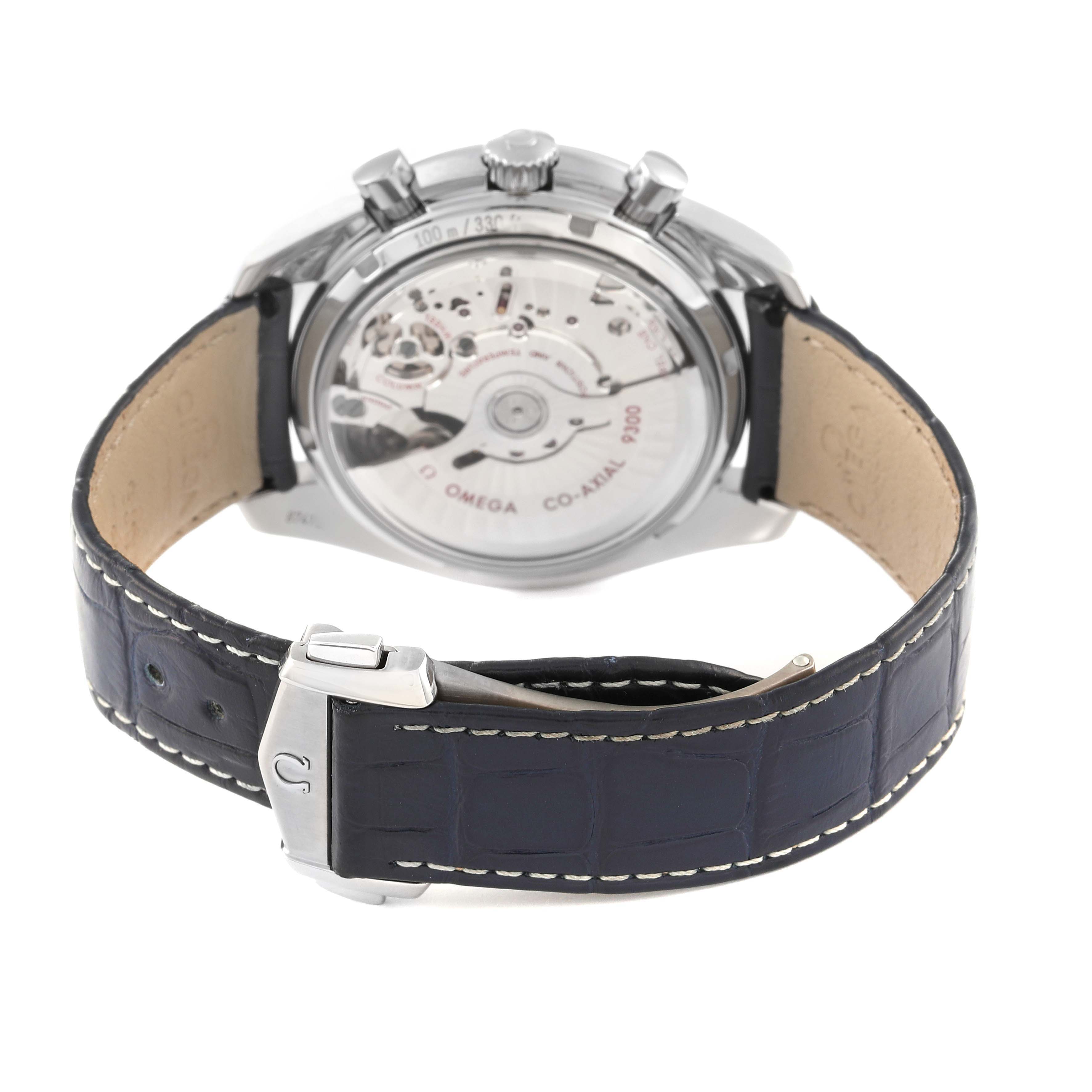 The image shows the back view of an Omega Speedmaster 311.93.44.51.03.001 Men's Titanium Blue Dial 311.93.44.51.03.001 Men's Titanium Blue Dial watch with a visible Co-Axial movement and a dark leather strap.