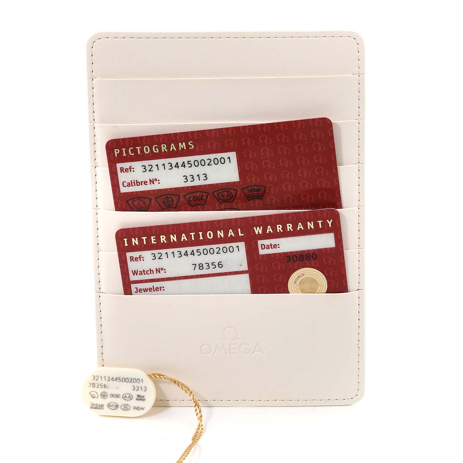 This image shows the warranty cards and cards holder for the Omega Speedmaster 321.13.44.50.02.001 Men's Stainless Steel Red Dial 321.13.44.50.02.001 Men's Stainless Steel Red Dial watch.