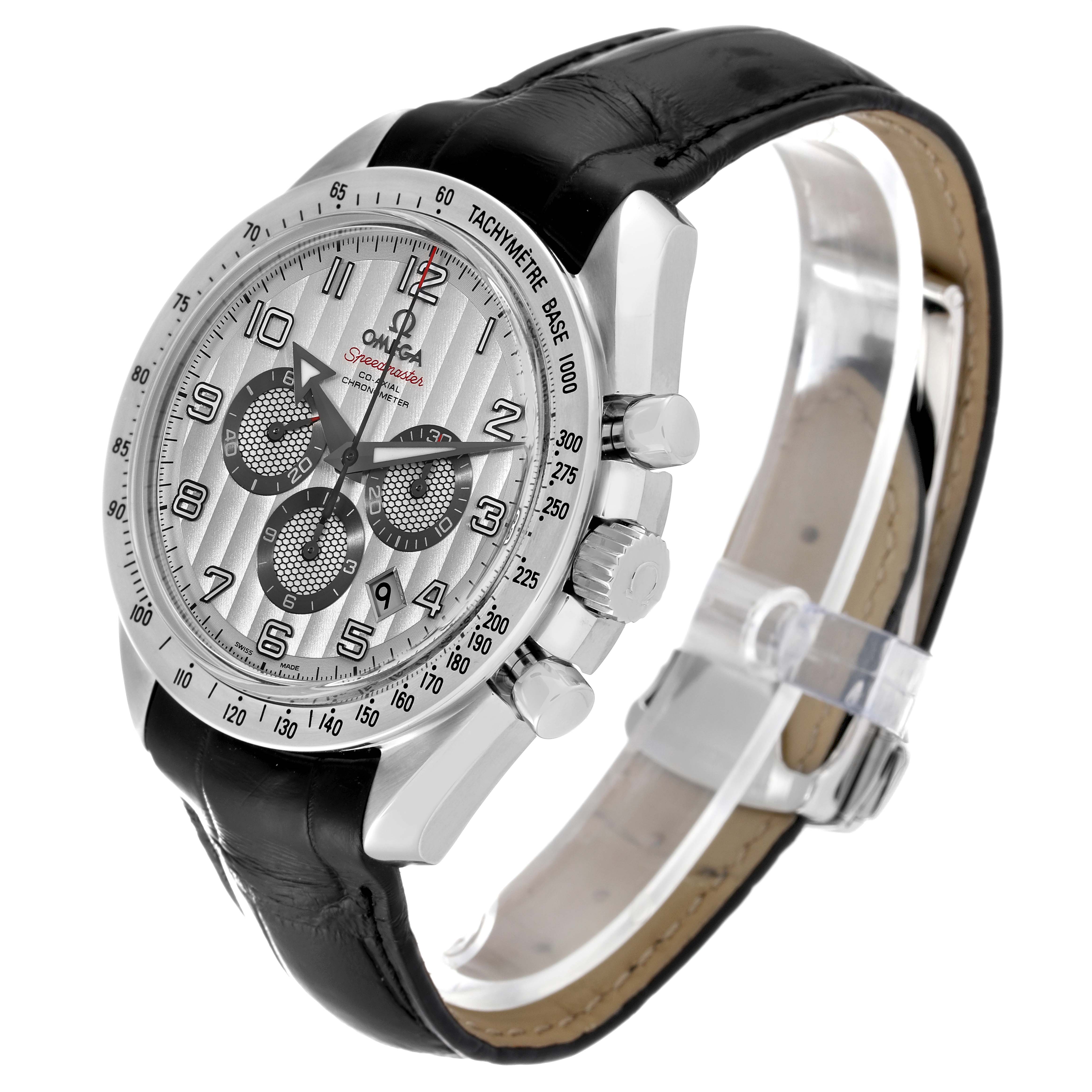 This Omega Speedmaster 321.13.44.50.02.001 Men's Stainless Steel Red Dial 321.13.44.50.02.001 Men's Stainless Steel Red Dial watch is shown at a three-quarter angle, highlighting its face, bezel, and black leather strap.