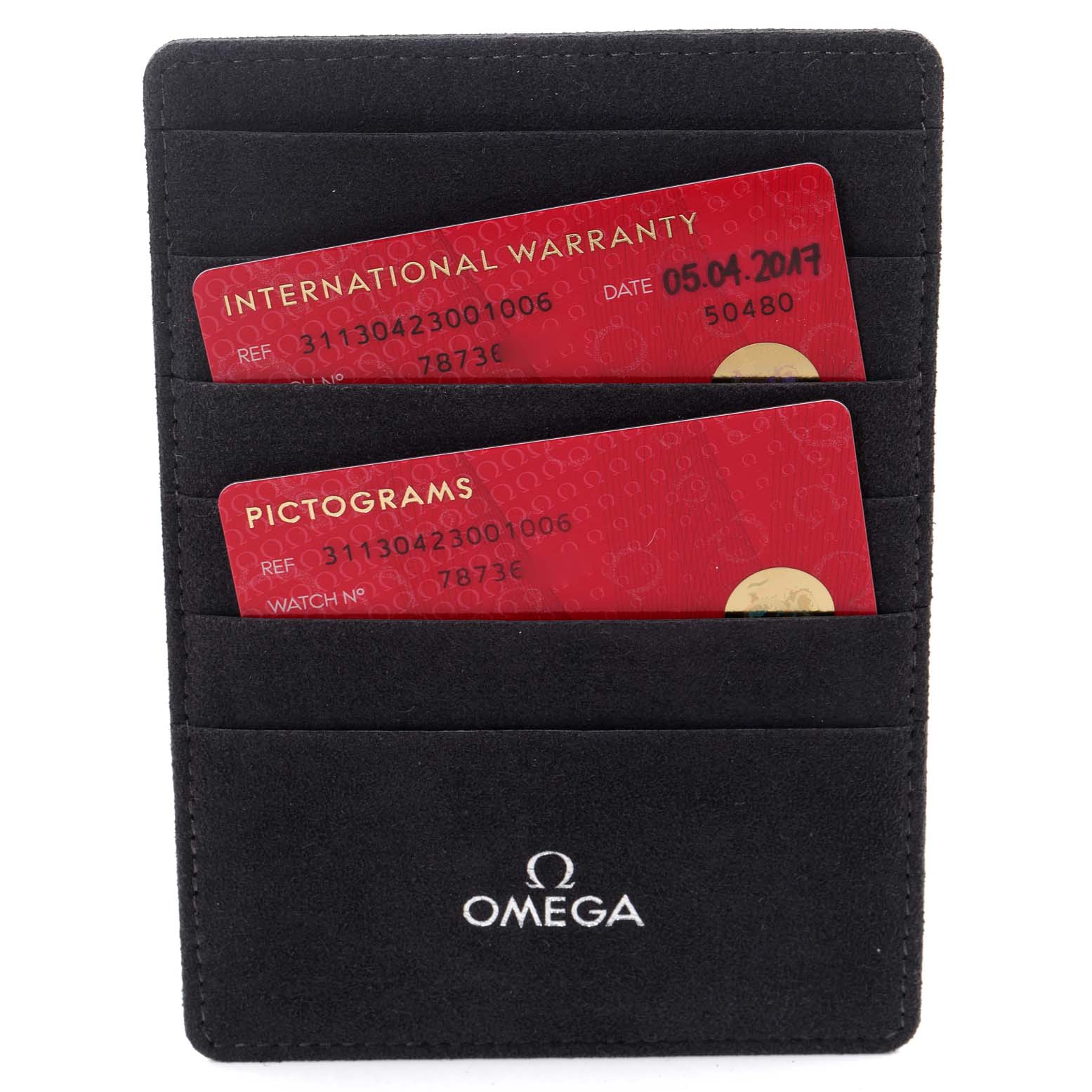 The image shows an Omega Speedmaster 311.30.42.30.01.006 Men's Stainless Steel Black Dial 311.30.42.30.01.006 Men's Stainless Steel Black Dial warranty card holder with two red cards for International Warranty and Pictograms.