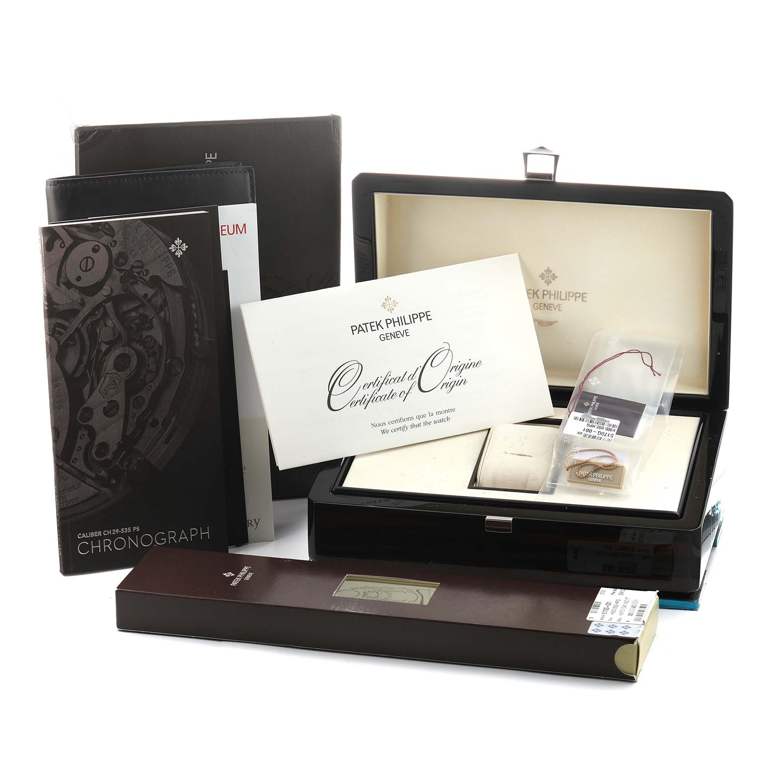 The image shows packaging and documentation for a Patek Philippe Complications 5170G-010 Men's White Gold Silver Dial model, including a box, certificate, and manuals.