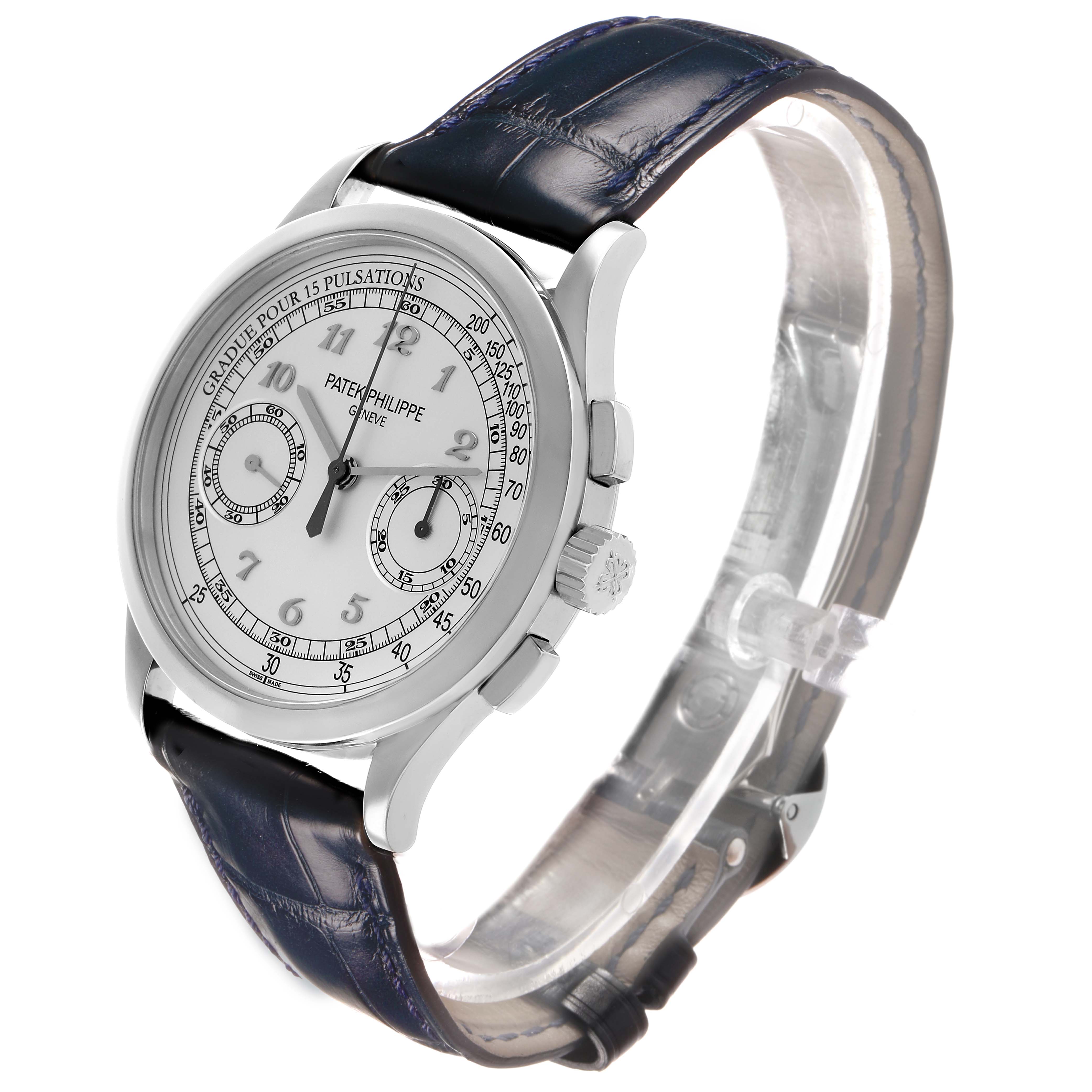 The Patek Philippe Complications 5170G-010 Men's White Gold Silver Dial watch is shown at a three-quarter angle highlighting the dial, side buttons, and leather strap.