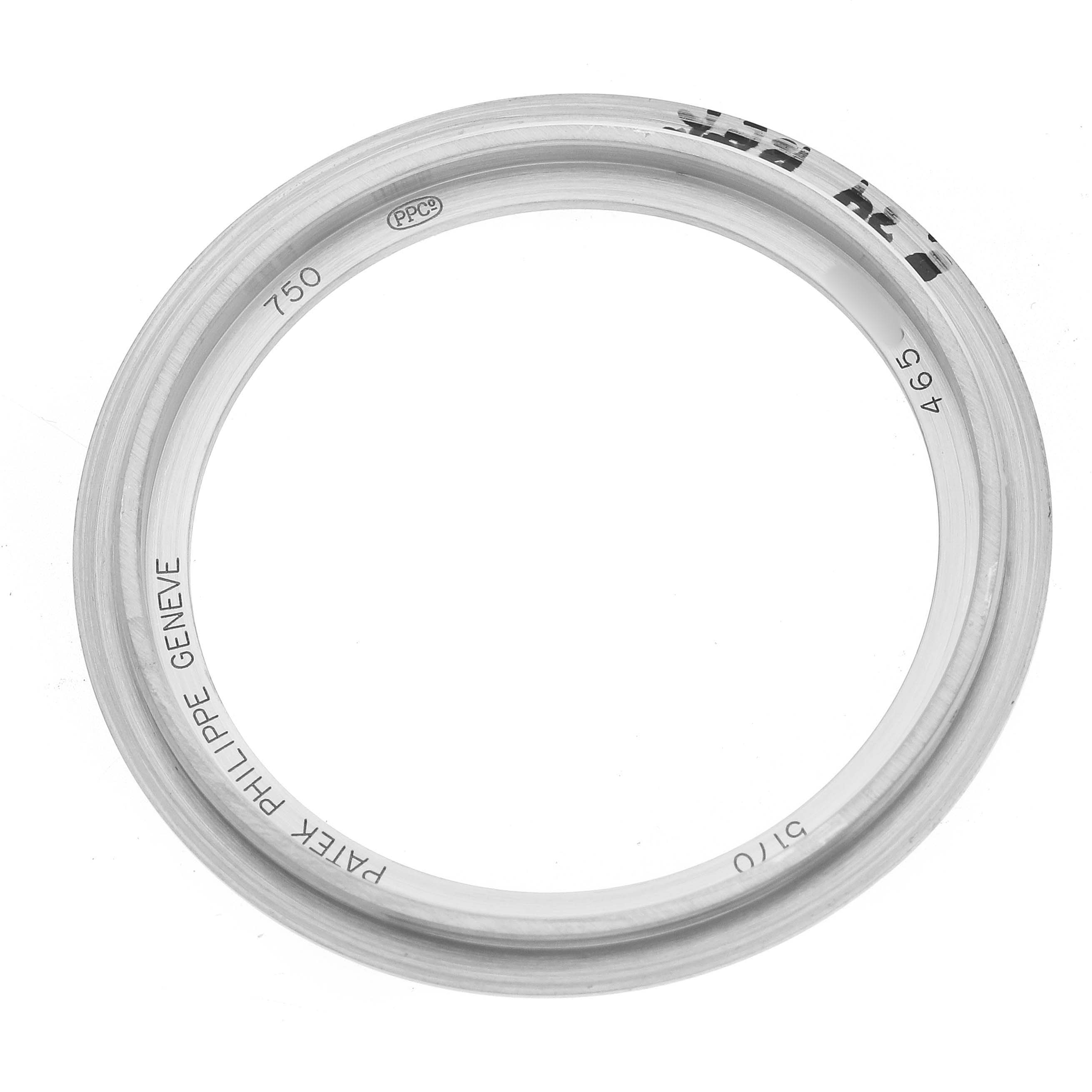 The image shows a Patek Philippe Complications 5170G-010 Men's White Gold Silver Dial model bezel from a top-down angle.