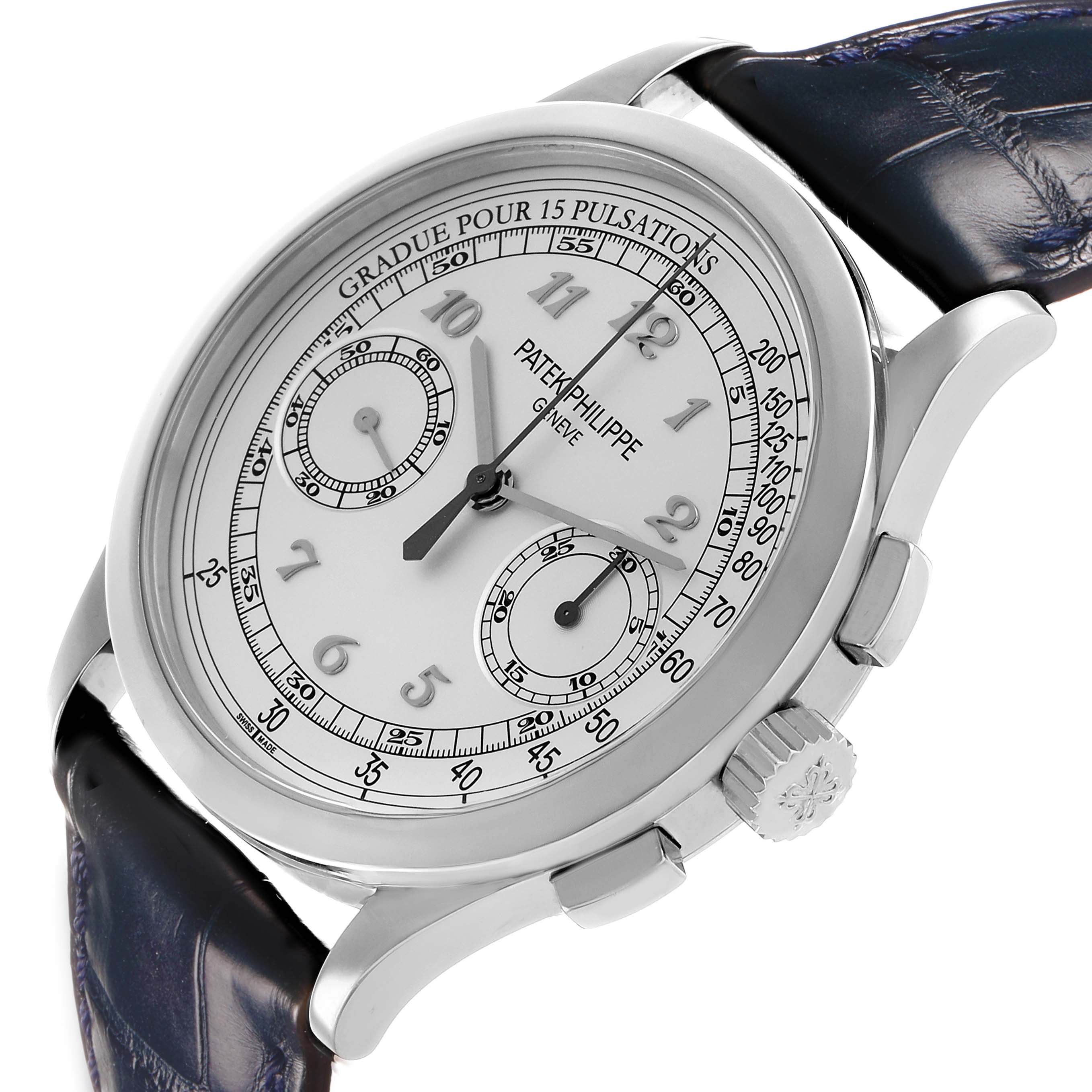 The Patek Philippe Complications 5170G-010 Men's White Gold Silver Dial watch is shown at an angled side view, featuring its dial, crown, pushers, and dark strap.