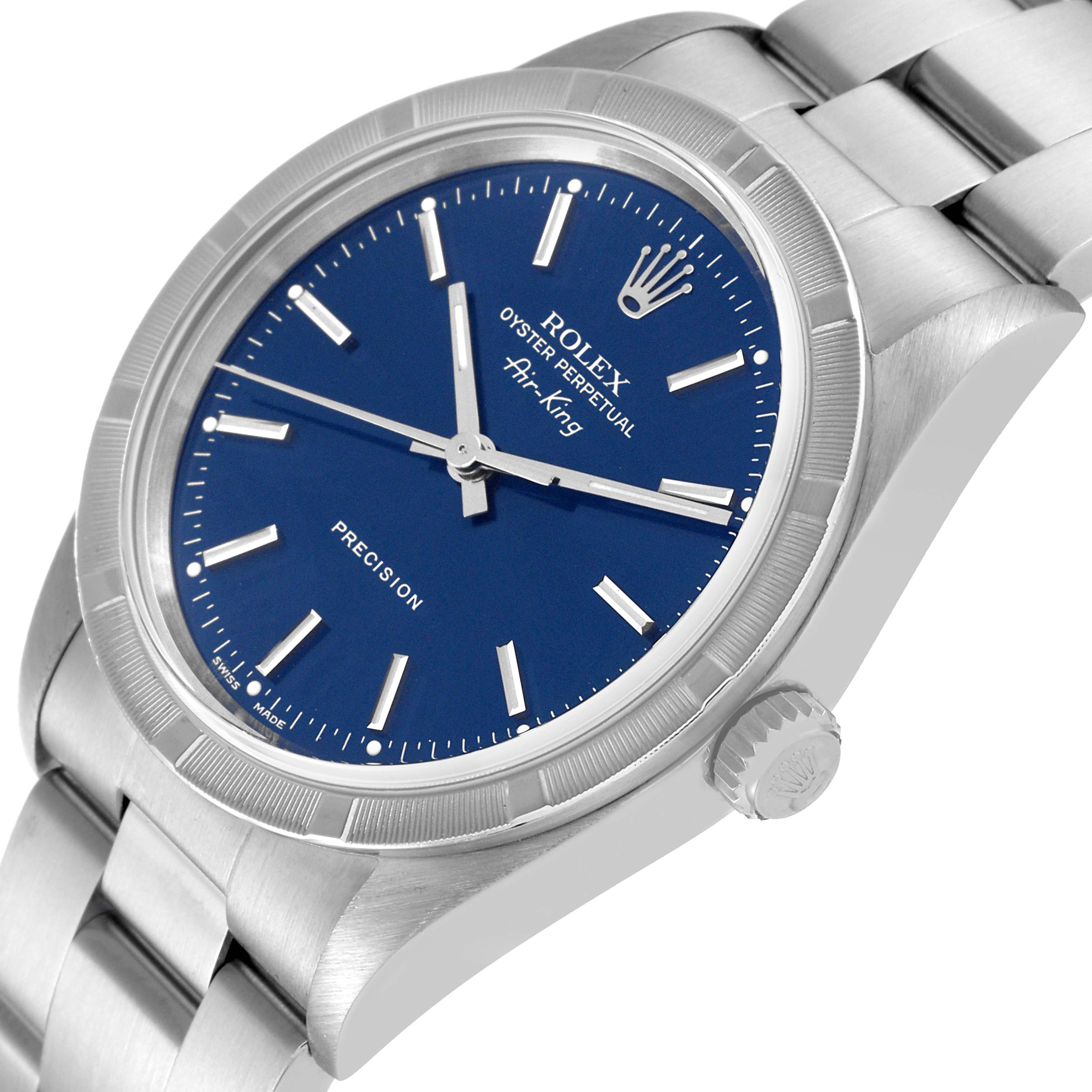 The image shows a side angle of the Rolex Air-King 14010 Men's Stainless Steel Blue Dial 14010 Men's Stainless Steel Blue Dial watch, highlighting its blue dial, crown, and stainless steel bracelet.