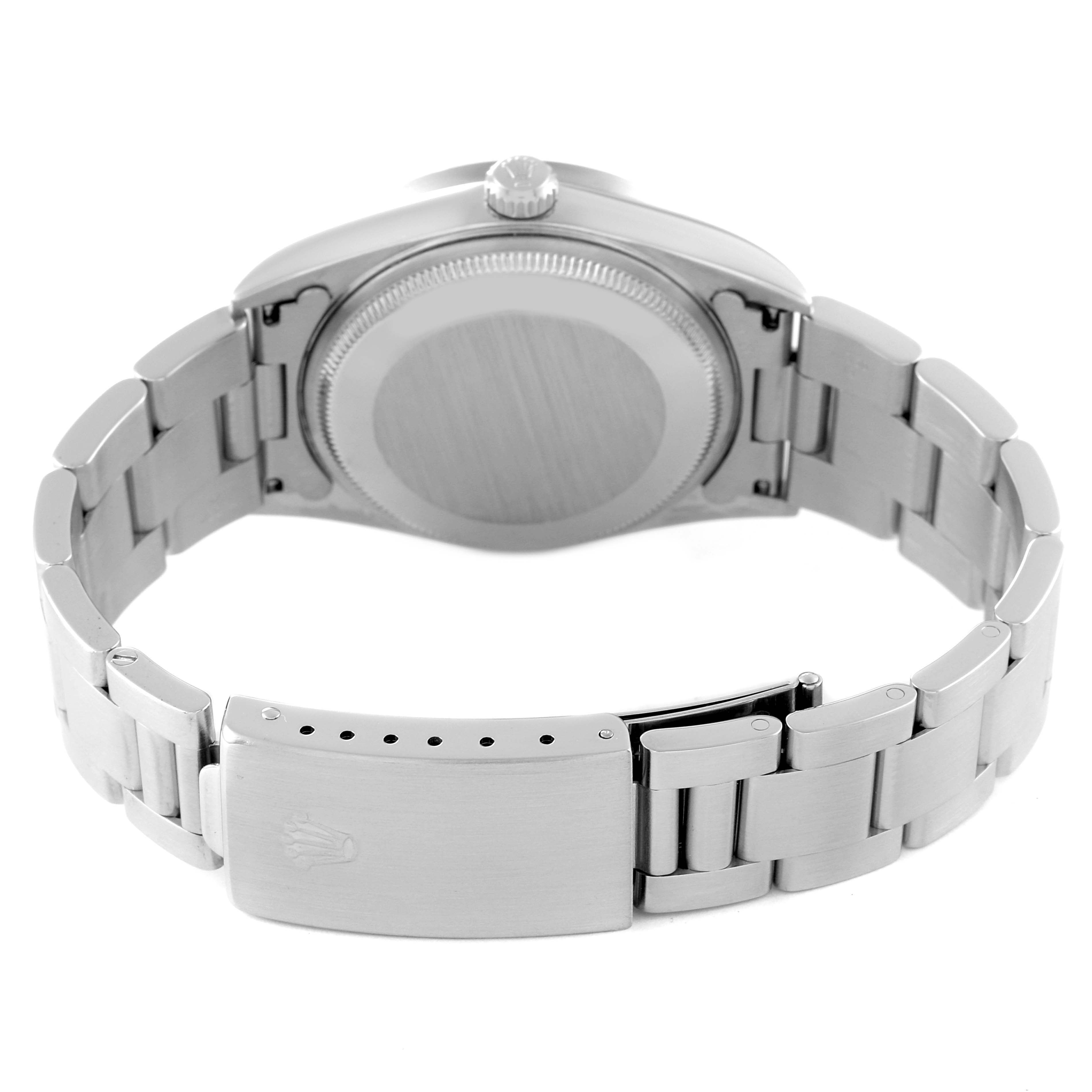 The image shows the back view of a Rolex Air-King 14010 Men's Stainless Steel Blue Dial 14010 Men's Stainless Steel Blue Dial watch, highlighting the case back and metal bracelet clasp.