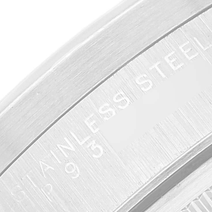 The image shows a close-up of the stainless steel engraving on the inner bezel of the Rolex Air-King 14010 Men's Stainless Steel Blue Dial 14010 Men's Stainless Steel Blue Dial watch.