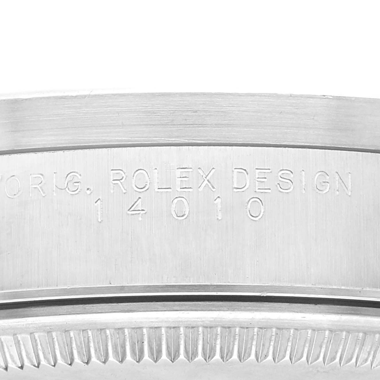 This image shows a close-up of the model and design engraving on the case side of a Rolex Air-King 14010 Men's Stainless Steel Blue Dial 14010 Men's Stainless Steel Blue Dial watch.