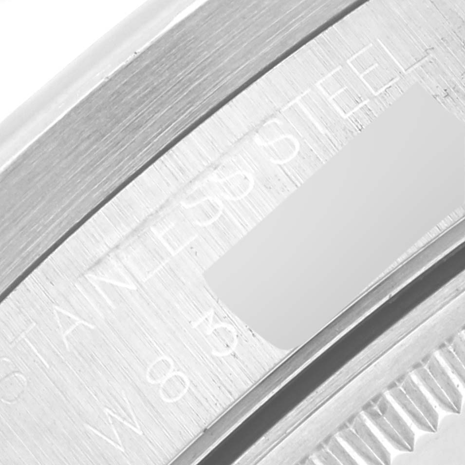 The image shows an angled close-up of the case back engraving on a Rolex Air-King 14010 Men's Stainless Steel Grey Dial 14010 Men's Stainless Steel Grey Dial watch, highlighting the stainless steel detail.