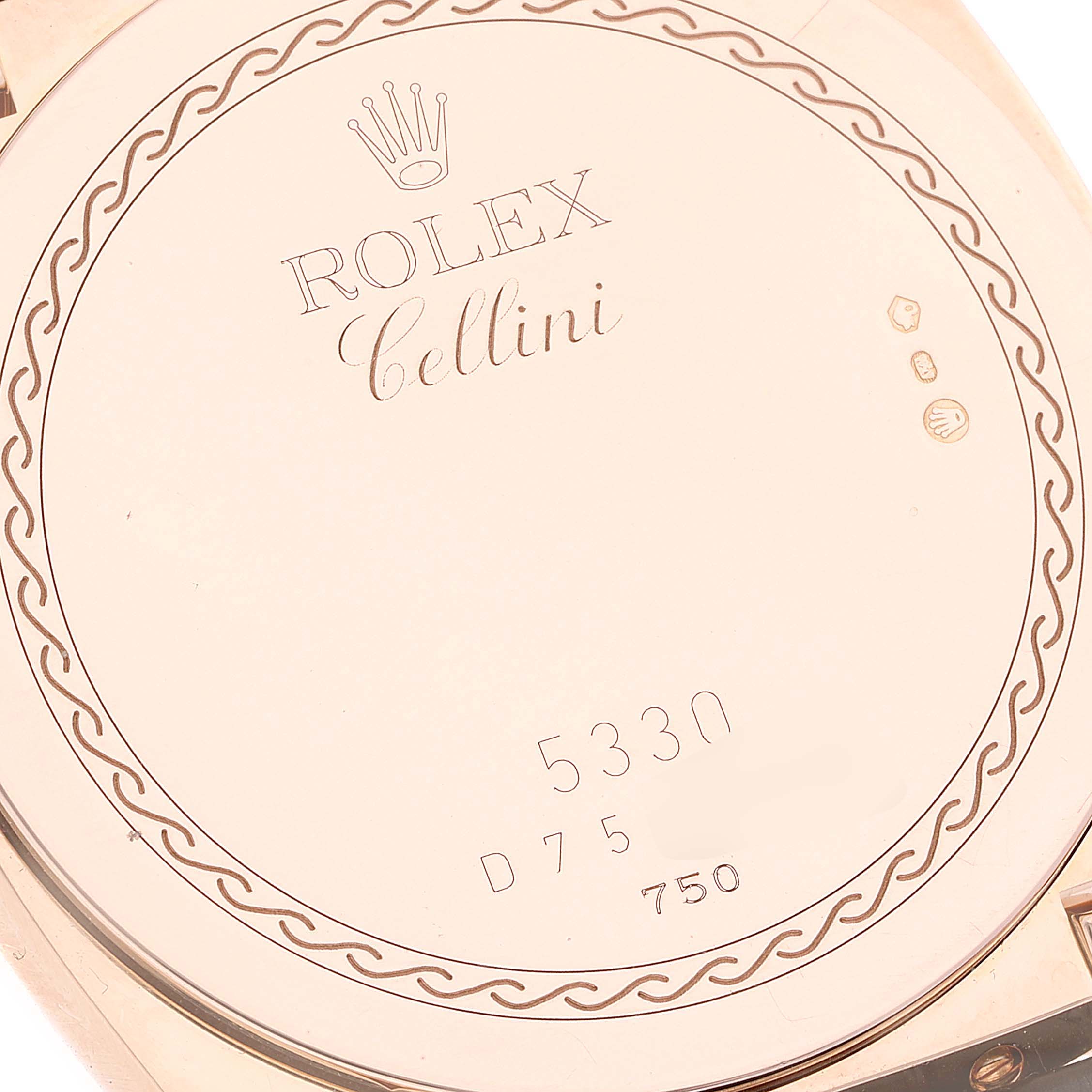This is the case back of a Rolex Cellini 5330 Men's Rose Gold Grey Dial 5330 Men's Rose Gold Grey Dial model, showing the engraved Rolex logo and Cellini name.