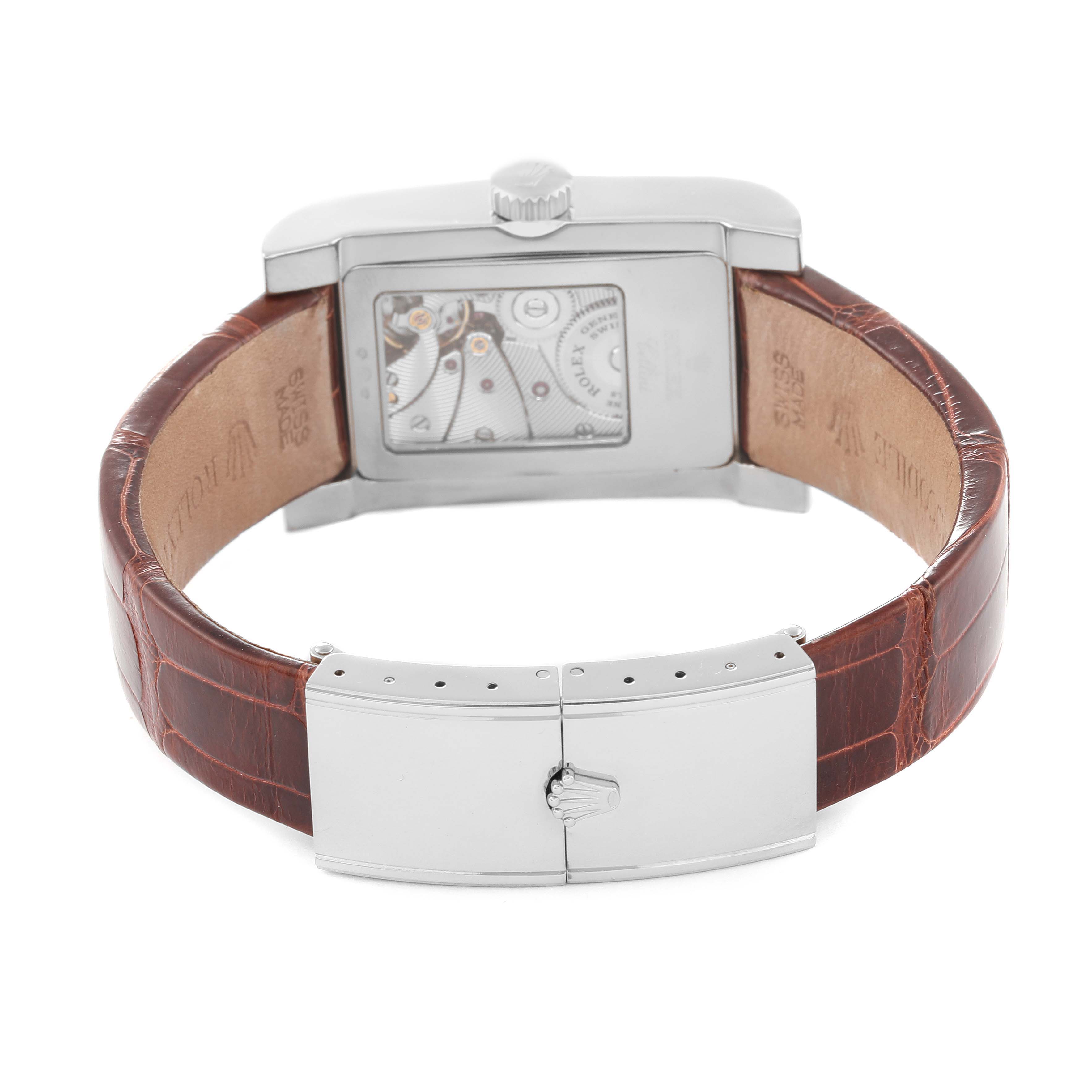 This image shows the back of the Rolex Cellini 5441/9 Men's White Gold Silver Dial 5441/9 Men's White Gold Silver Dial watch, highlighting its leather strap, clasp, and exposed movement.