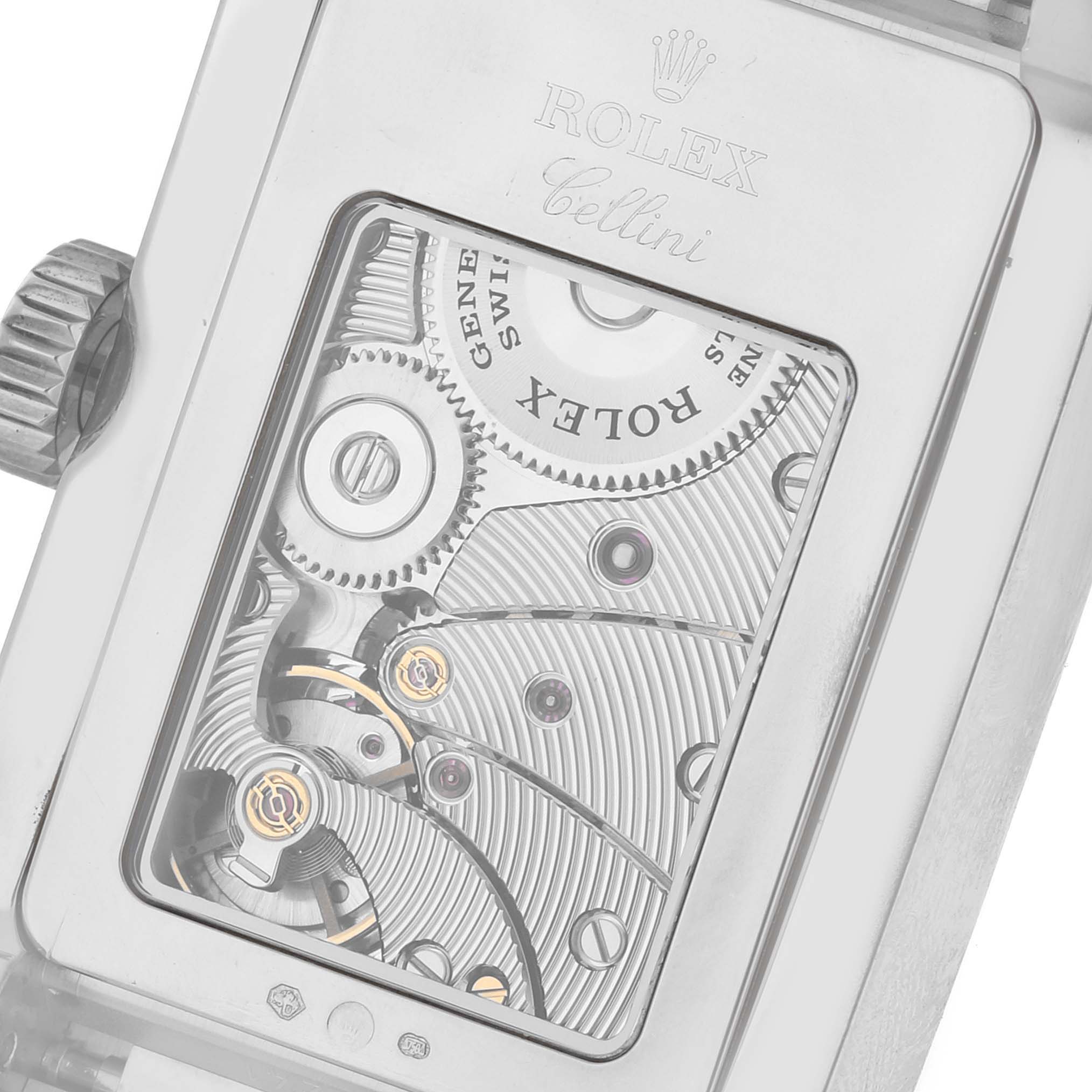 The image shows a close-up of the Rolex Cellini 5441/9 Men's White Gold Silver Dial 5441/9 Men's White Gold Silver Dial watch, highlighting its intricate back movement and gears.