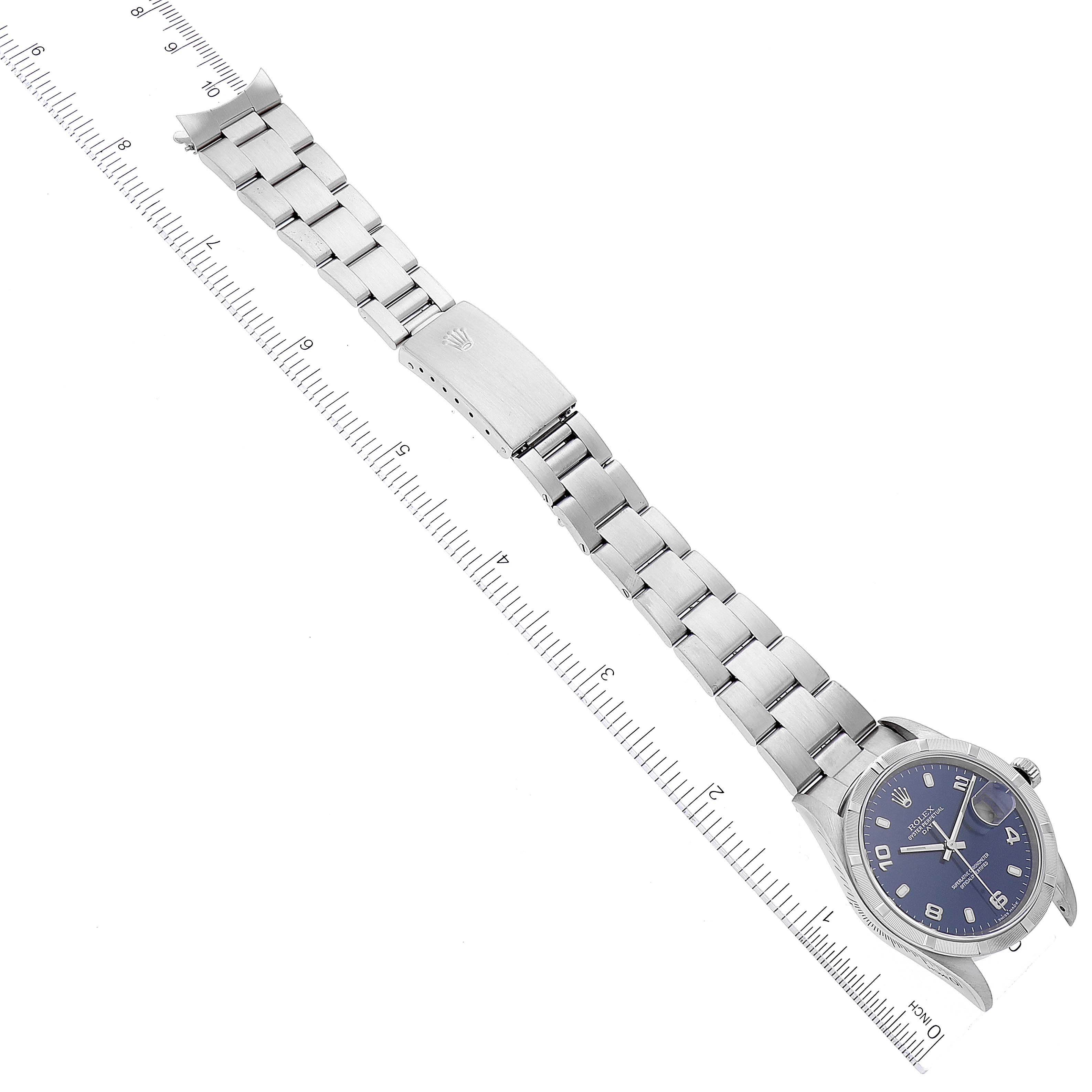 The image shows the full length of a Rolex Date 15210 Men
s Stainless Steel Blue Dial 15210 Men
s Stainless Steel Blue Dial model watch laid flat, viewed from above, with the face, band, and clasp visible.