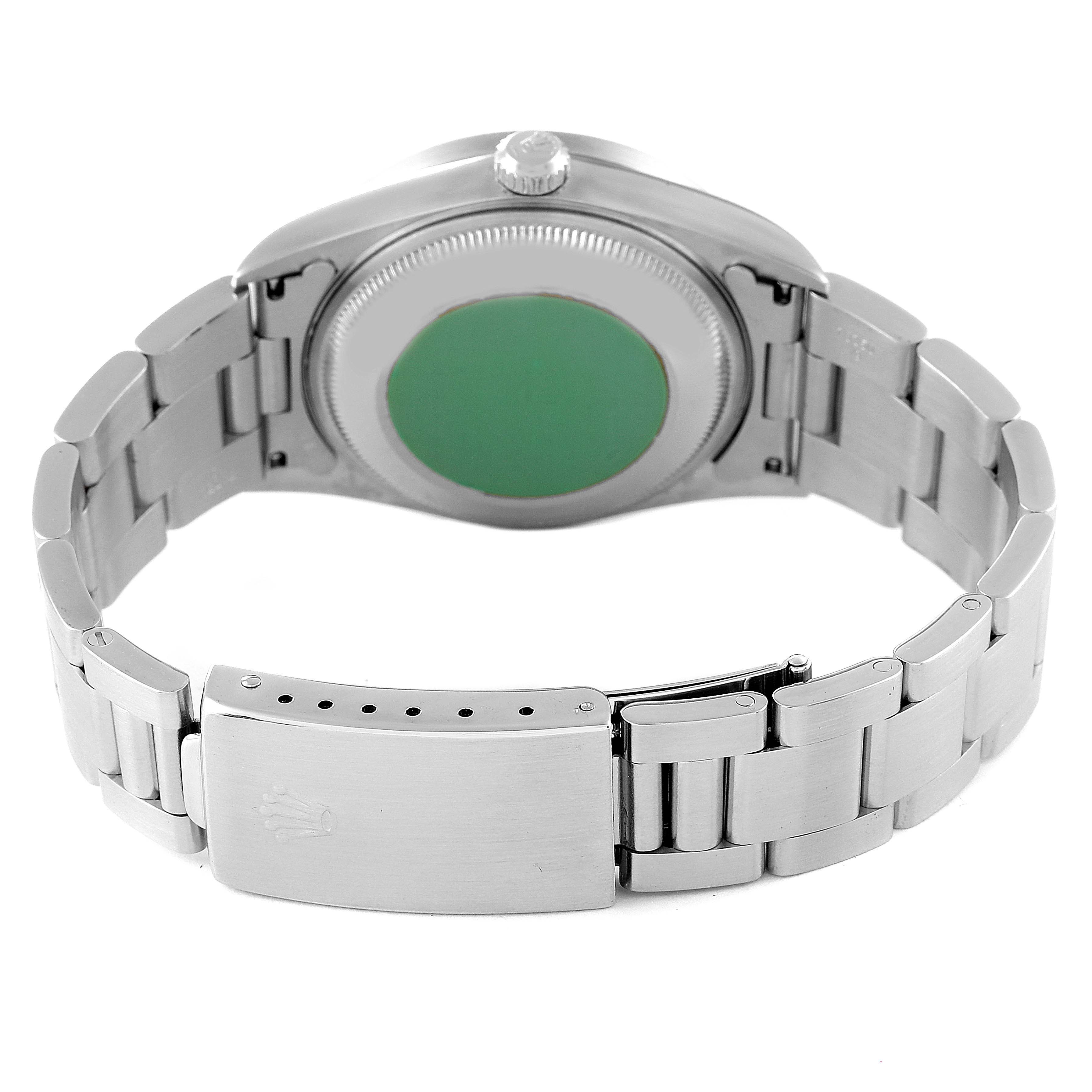 This image shows the back case and bracelet of a Rolex Date 15210 Men
s Stainless Steel Blue Dial 15210 Men
s Stainless Steel Blue Dial model watch.