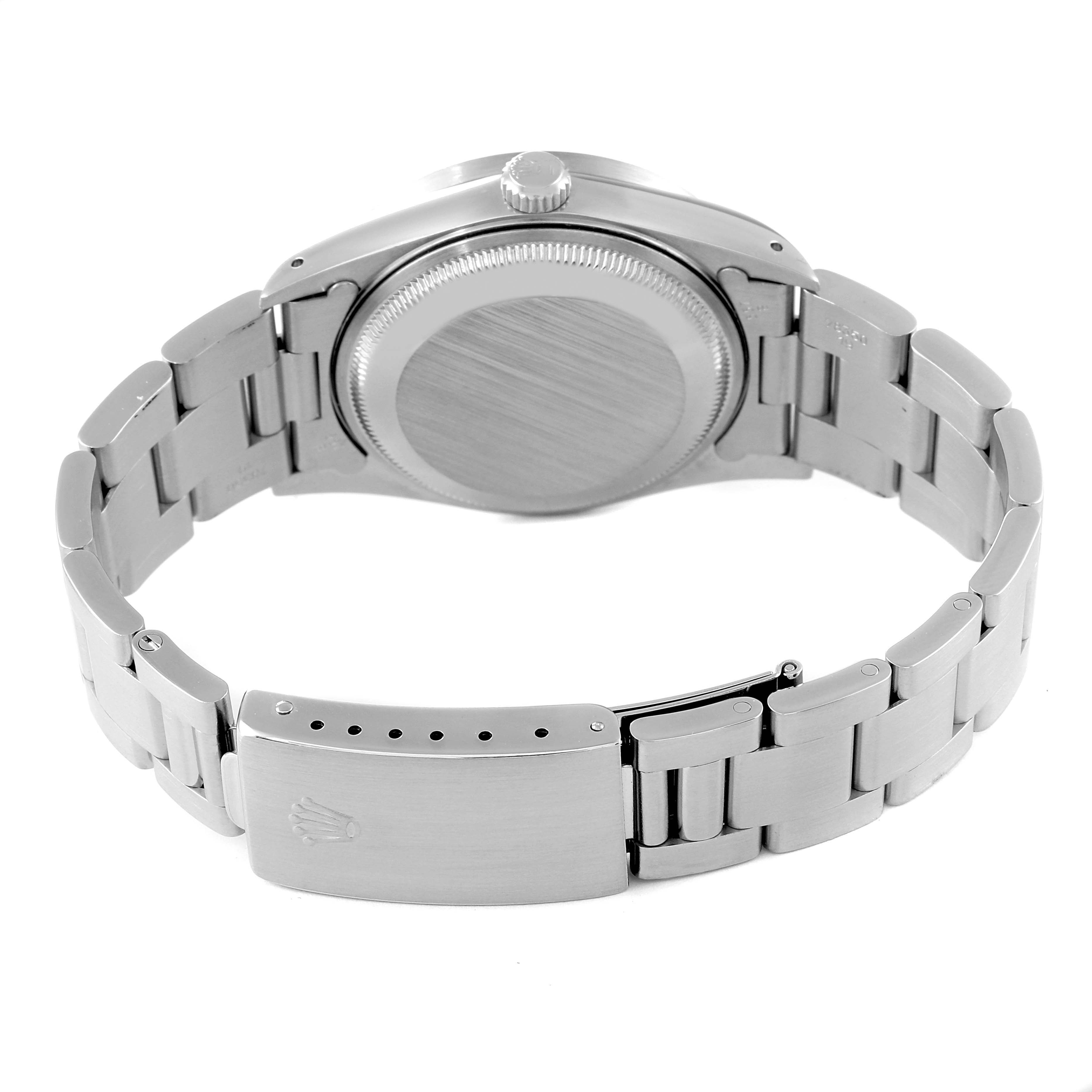 The image shows the back view of a Rolex Date 15210 Men
s Stainless Steel Silver Dial 15210 Men
s Stainless Steel Silver Dial model watch, highlighting its bracelet, clasp, and case back.