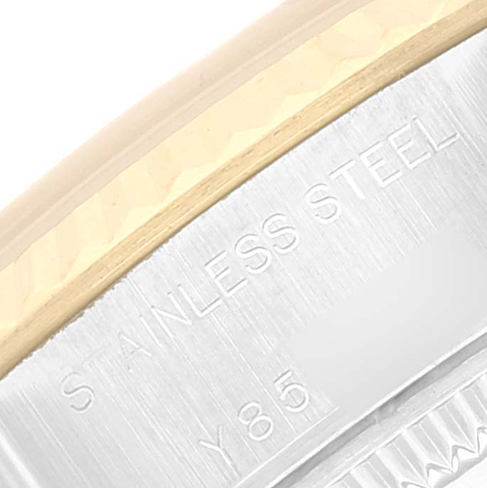 The close-up image shows the side view of a Rolex Datejust 79173 Women's Steel and Gold (two tone) White Dial 79173 Women's Steel and Gold (two tone) White Dial watch, highlighting its stainless steel and gold bezel.