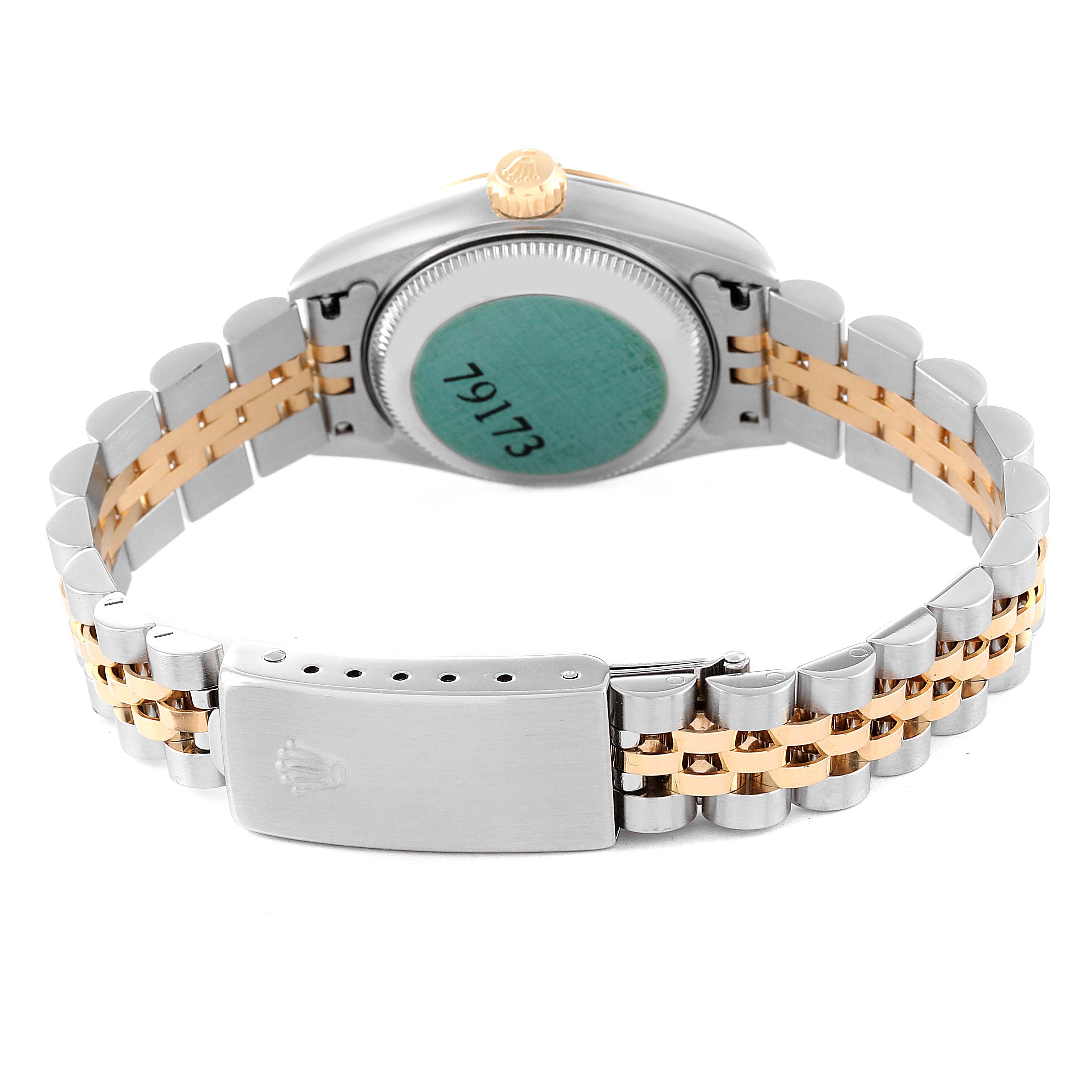 The image shows the back view of a Rolex Datejust 79173 Women's Steel and Gold (two tone) White Dial 79173 Women's Steel and Gold (two tone) White Dial watch, focusing on the case back, crown, and jubilee bracelet with the clasp.