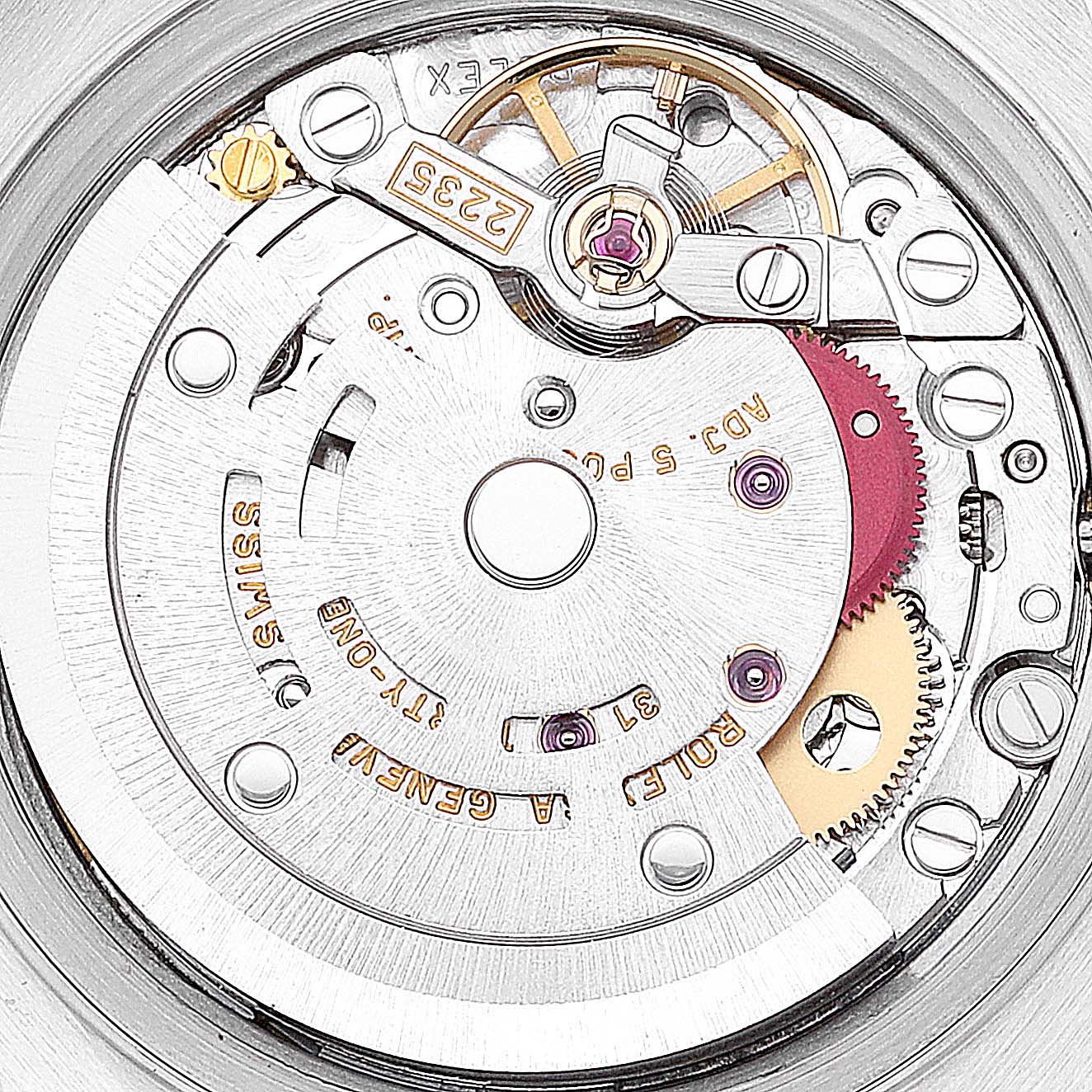 This image shows an internal view of the Rolex Datejust 79173 Women's Steel and Gold (two tone) White Dial 79173 Women's Steel and Gold (two tone) White Dial watch's movement and intricate mechanical parts.
