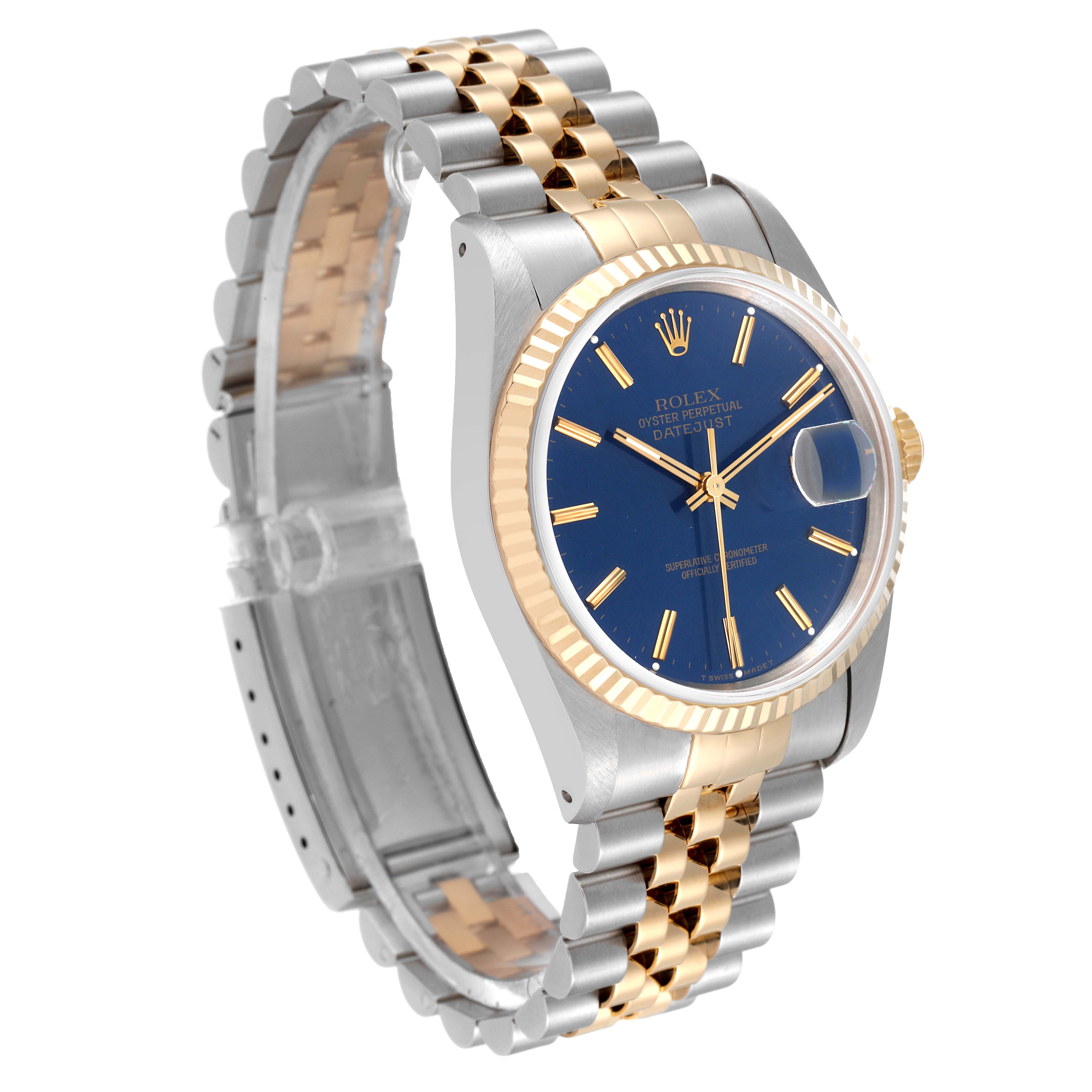 This image shows a side angled view of a Rolex Datejust 16233 Men's Steel and Gold (two tone) Blue Dial 16233 Men's Steel and Gold (two tone) Blue Dial watch, highlighting its blue dial, fluted bezel, and two-tone bracelet.