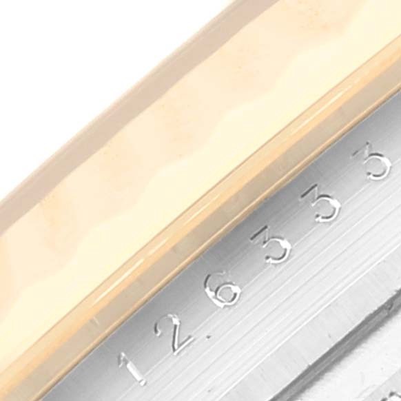 The image shows a close-up of the bezel and part of the dial of a Rolex Datejust 41 126333 Men's Steel and Gold (two tone) Grey Dial 126333 Men's Steel and Gold (two tone) Grey Dial.