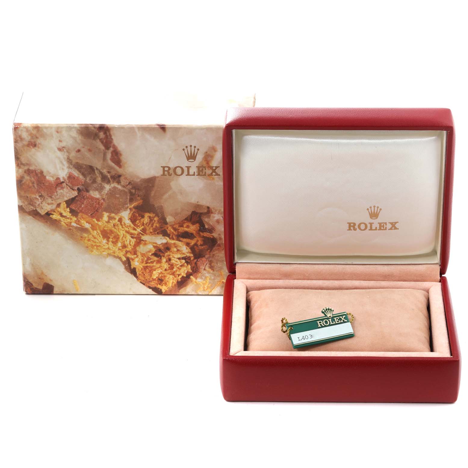 The image shows the packaging box of a Rolex Datejust 69173 Women's Steel and Gold (two tone) Champagne Dial 69173 Women's Steel and Gold (two tone) Champagne Dial watch, including the outer box, inner box, and cushion with a tag.