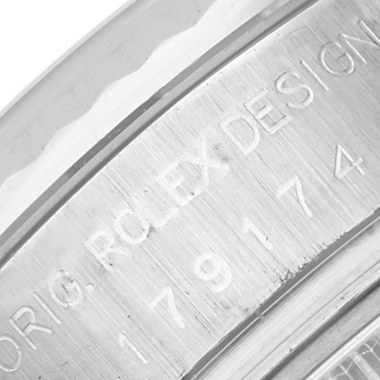 This is a close-up image showing the engraved model number and "Rolex Design" on the inner bezel of a Rolex Datejust 179174 Women's Stainless Steel Silver Dial 179174 Women's Stainless Steel Silver Dial.