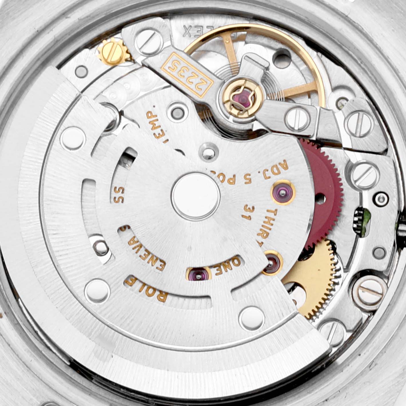 The image shows the movement mechanism of a Rolex Datejust 179174 Women's Stainless Steel Silver Dial 179174 Women's Stainless Steel Silver Dial watch from a close-up angle.