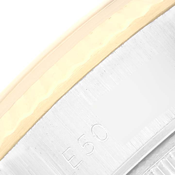 The image shows a close-up of the bezel and flange of a Rolex Datejust 69173 Women's Steel and Gold (two tone) Champagne Dial 69173 Women's Steel and Gold (two tone) Champagne Dial watch.