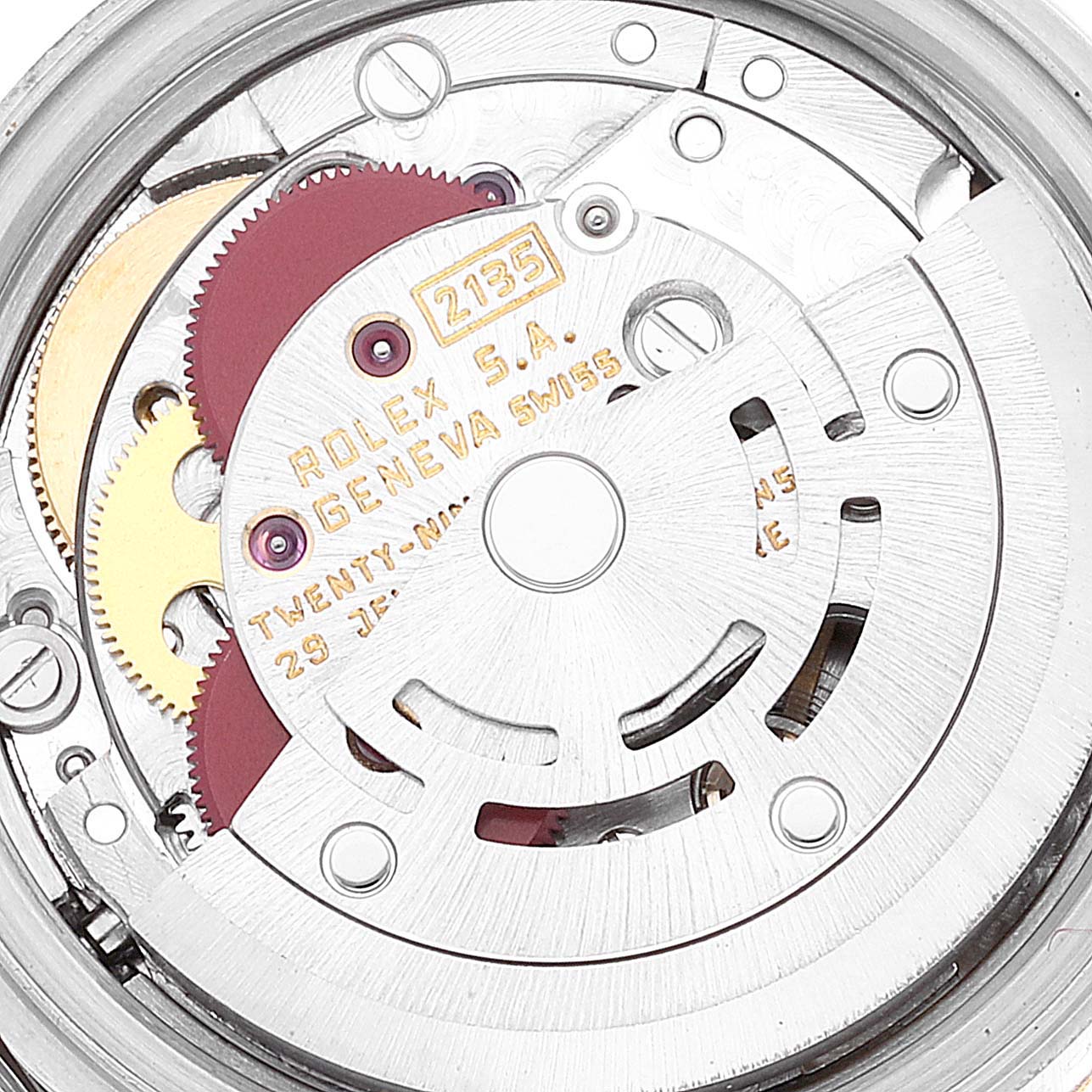 The image shows the internal mechanism of a Rolex Datejust 69173 Women's Steel and Gold (two tone) Champagne Dial 69173 Women's Steel and Gold (two tone) Champagne Dial watch, focusing on the movement and gears.