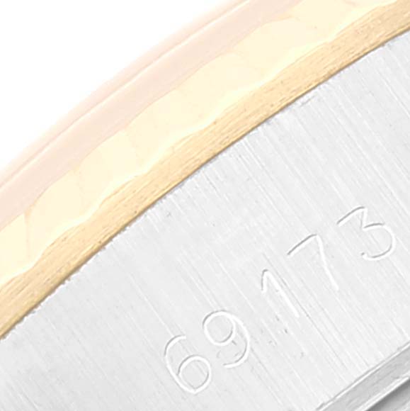 This image shows a close-up of the Rolex Datejust 69173 Women's Steel and Gold (two tone) Champagne Dial 69173 Women's Steel and Gold (two tone) Champagne Dial model's case, focusing on the serial/part number 69173.