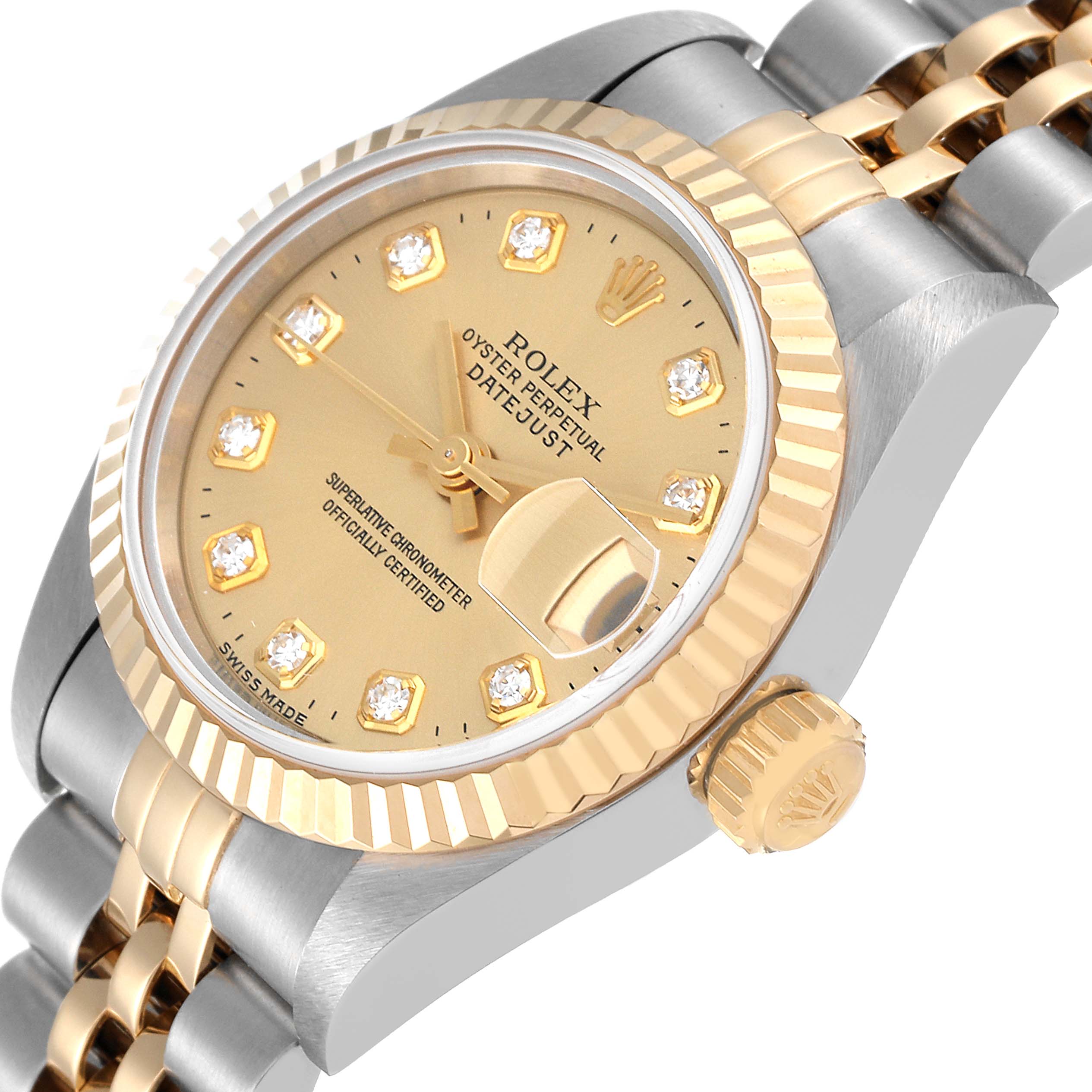 The image shows a close-up of a Rolex Datejust 69173 Women's Steel and Gold (two tone) Champagne Dial 69173 Women's Steel and Gold (two tone) Champagne Dial watch, highlighting its gold dial, diamond markers, fluted bezel, and two-tone bracelet.