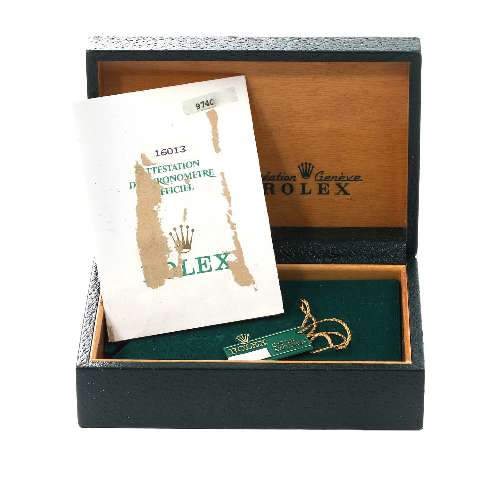 This image shows an open Rolex Vintage Collection 16013 Men's Steel and Gold (two tone) Champagne Dial 16013 Men's Steel and Gold (two tone) Champagne Dial watch box with its certificate and a tag inside.