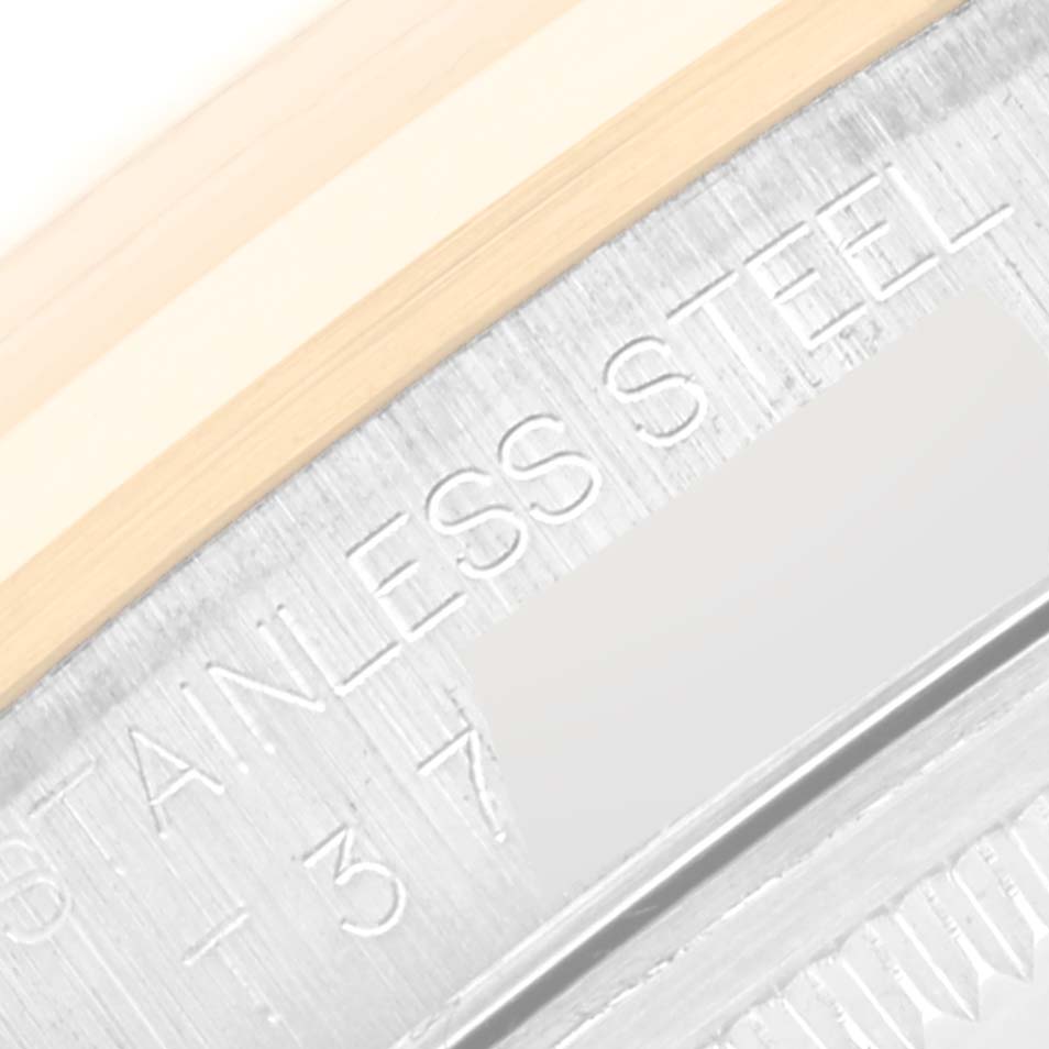 The image shows a close-up of the stainless steel caseback with engraved text of the Rolex Datejust 16203 Men's Steel and Gold (two tone) Mother of Pearl Dial 16203 Men's Steel and Gold (two tone) Mother of Pearl Dial model.