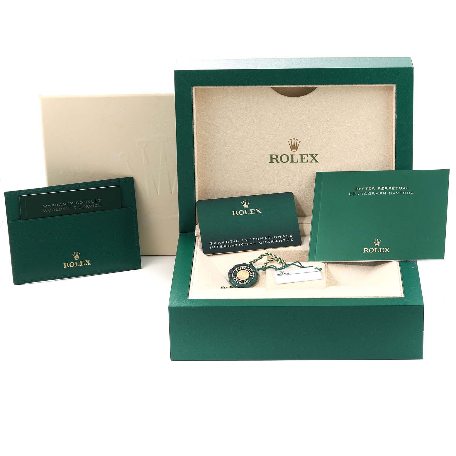 The image shows a Rolex Daytona 116518LN Men's Yellow Gold Black Dial 116518LN Men's Yellow Gold Black Dial watch box, warranty booklet, international guarantee card, and hang tag from a front angle view.