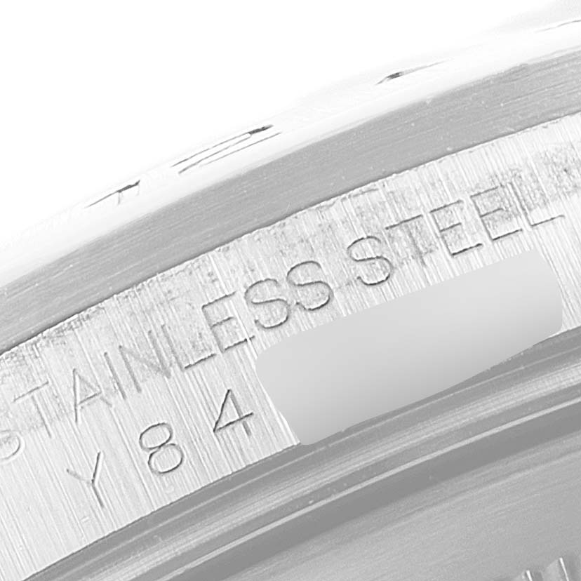This image shows a close-up of the stainless steel engraving on the Rolex Explorer 16570 Men's Stainless Steel White Dial 16570 Men's Stainless Steel White Dial watch case.