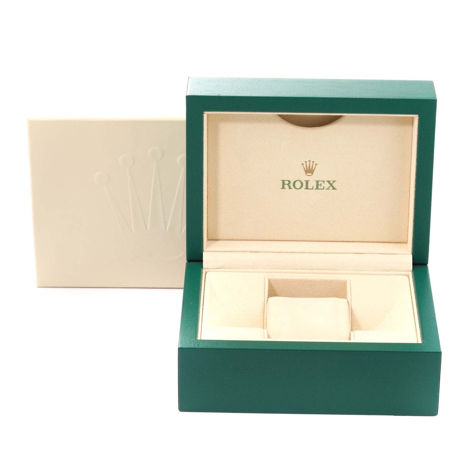 The image shows an open green and beige Rolex watch box for the Oyster Perpetual model, with the Rolex logo visible.