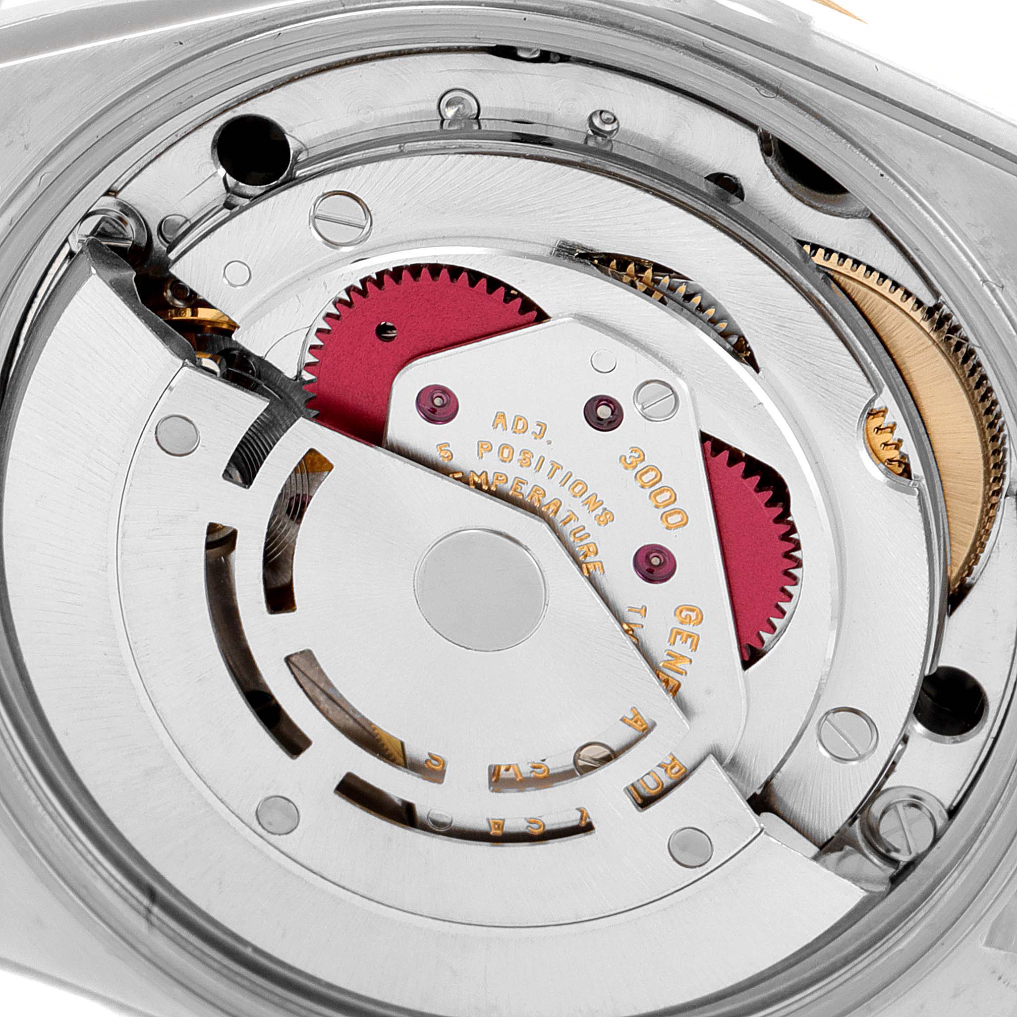 This image shows the internal mechanism and movement of a Rolex Oyster Perpetual 14233 Men's Steel and Gold (two tone) Black Dial 14233 Men's Steel and Gold (two tone) Black Dial watch from a top-down angle.