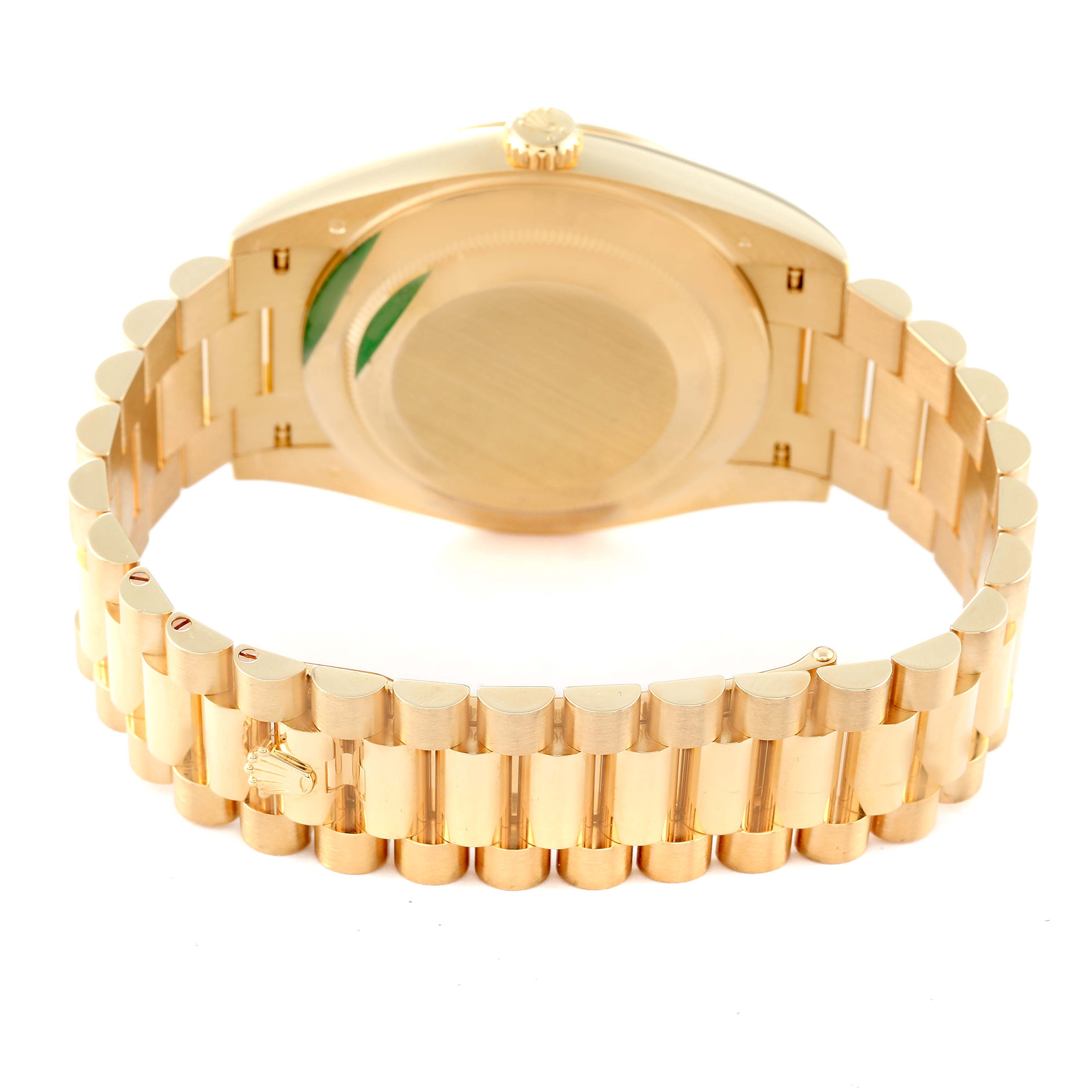 This image shows the back view of a Rolex President 228238 Men's Yellow Gold Black Dial 228238 Men's Yellow Gold Black Dial model watch, highlighting the bracelet and case back.