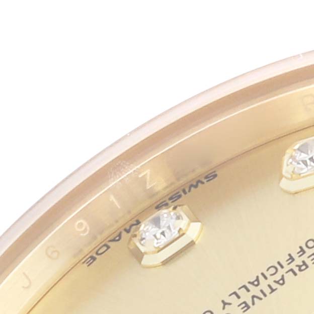 This image shows a partial view of the dial, bezel, and diamond hour markers of a Rolex President 178278 Women's Yellow Gold Champagne Dial 178278 Women's Yellow Gold Champagne Dial watch.