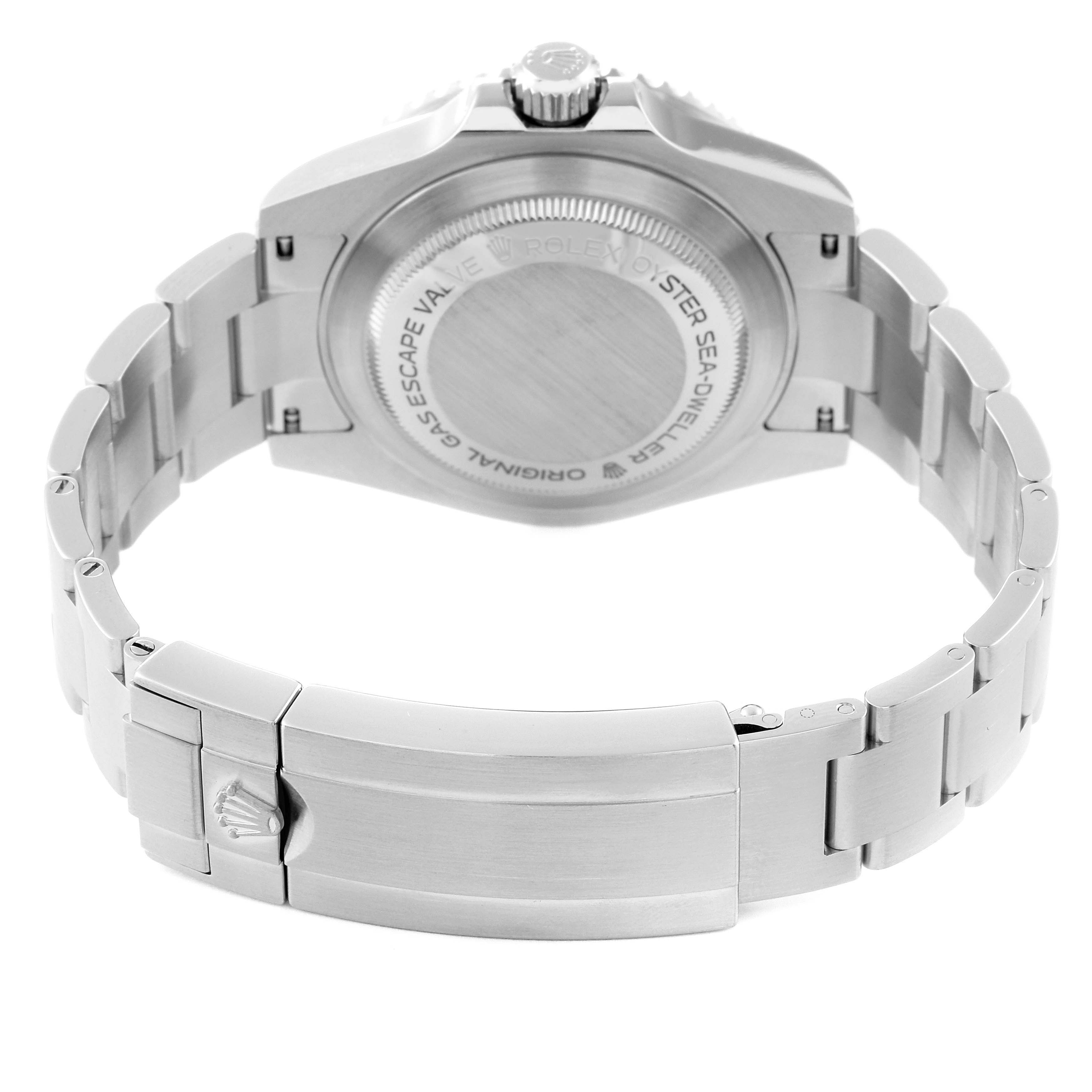 The image shows the back view of a Rolex Sea-Dweller 116600 Men
s Stainless Steel Black Dial 116600 Men
s Stainless Steel Black Dial watch, highlighting the case back and stainless steel bracelet.