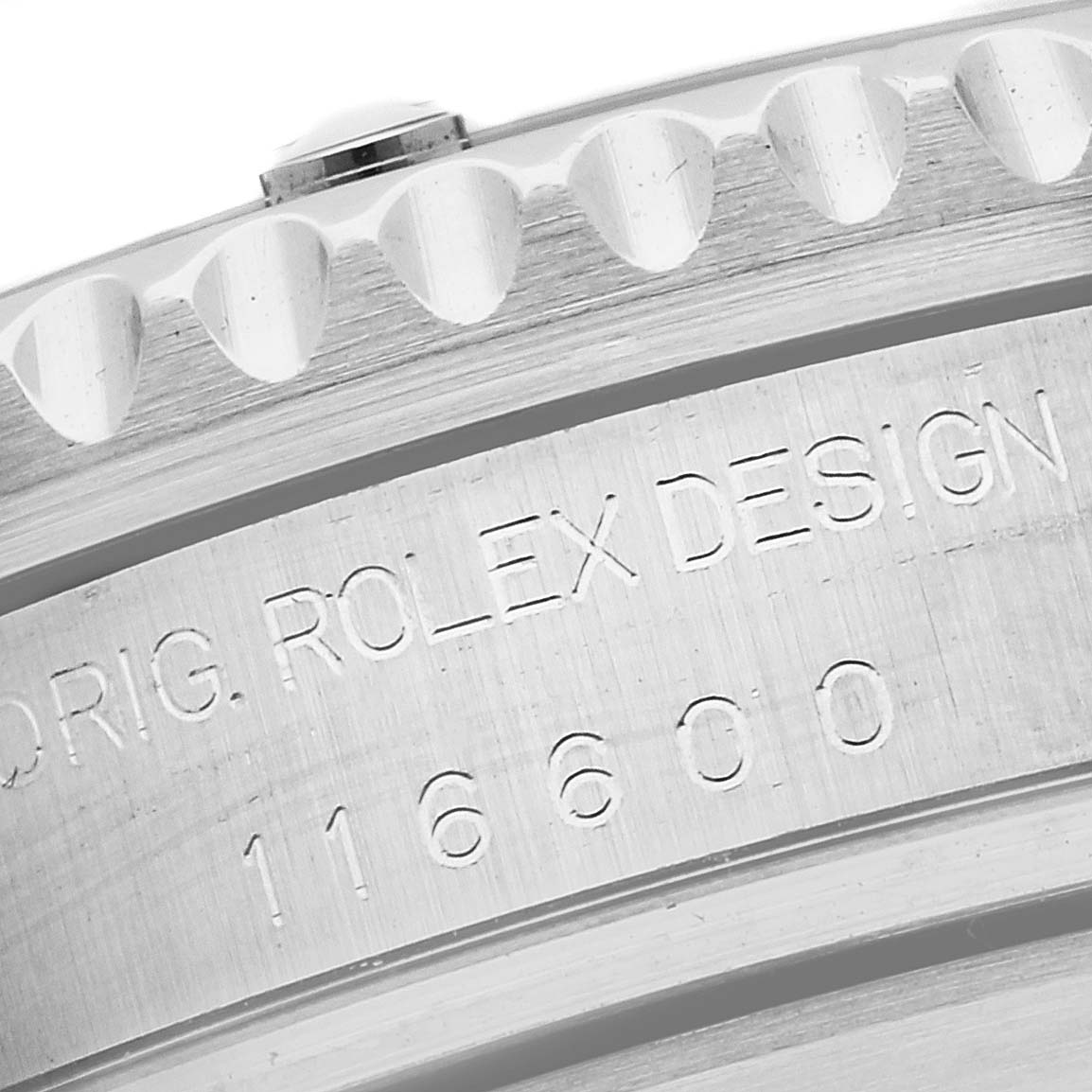 This is a close-up of the case side of a Rolex Sea-Dweller 116600 Men
s Stainless Steel Black Dial 116600 Men
s Stainless Steel Black Dial, showing the model number "16600" and "ROLEX DESIGN" engraving.