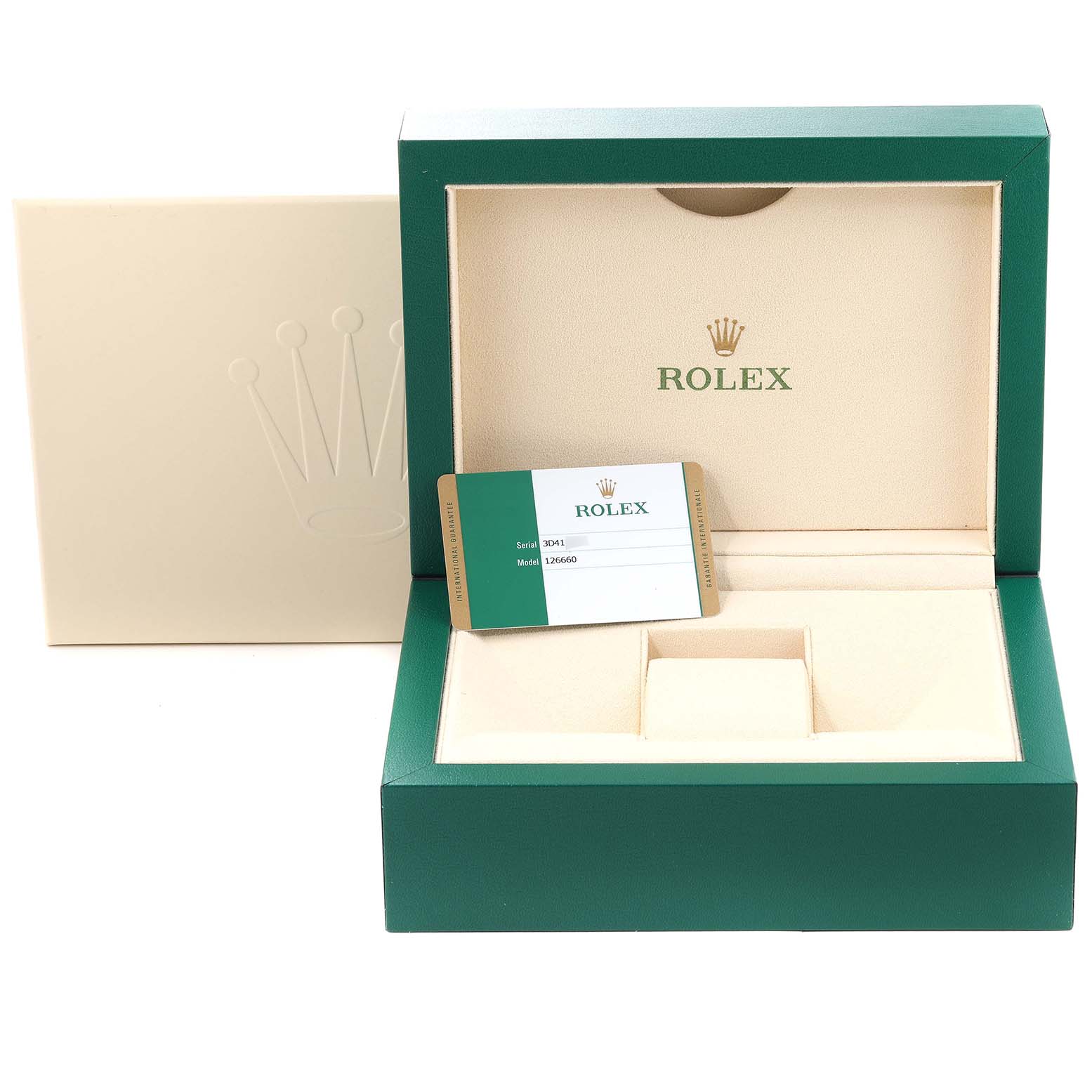 The image shows an open green Rolex watch box with a card, likely for a Sea-Dweller model, displaying the brand and model details.
