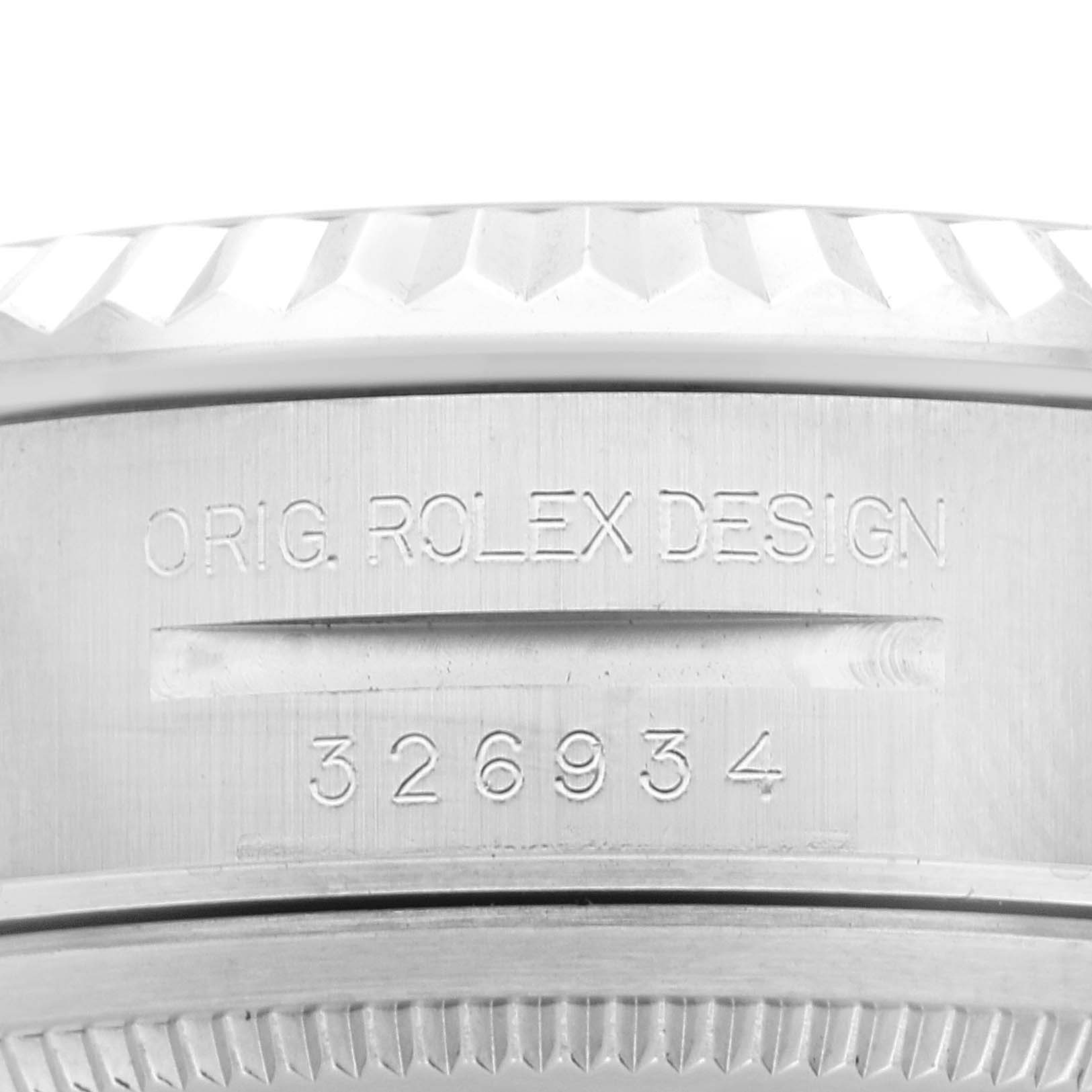 The image shows a close-up of the Rolex Sky-Dweller 326934 Men
s Stainless Steel Black Dial 326934 Men
s Stainless Steel Black Dial watch casing, featuring the model number and "ORIG. ROLEX DESIGN" engraving.